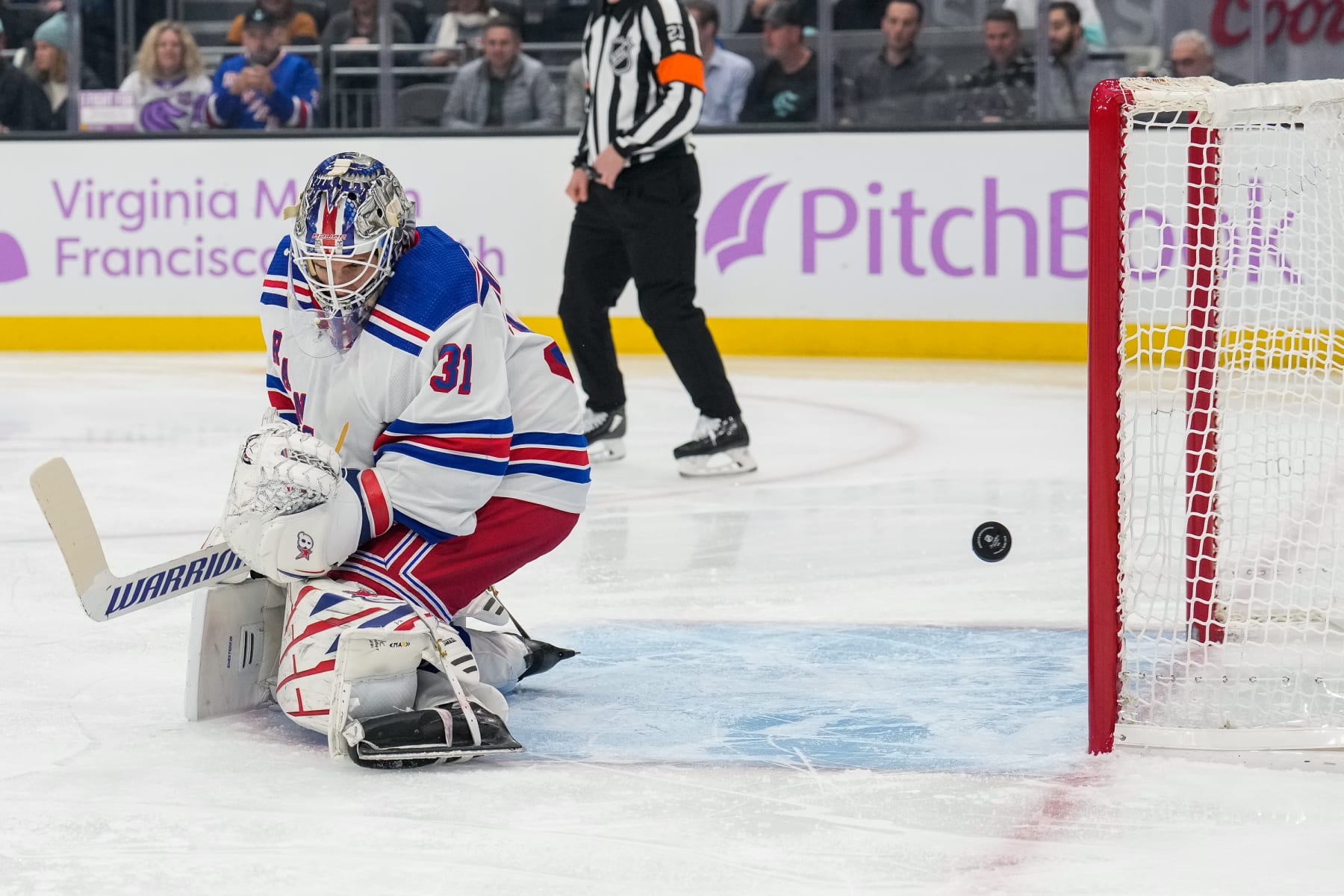 SEATTLE, WASHINGTON - NOVEMBER 17:A shot by Jared McCann #19 of the Seattle Kraken flies beyond Igor Shesterkin #31 of the New York Rangers for a goal during the first period of a game at Climate Pledge Arena on November 17, 2022 in Seattle, Washington. (Photo by Christopher Mast/NHLI via Getty Images)
