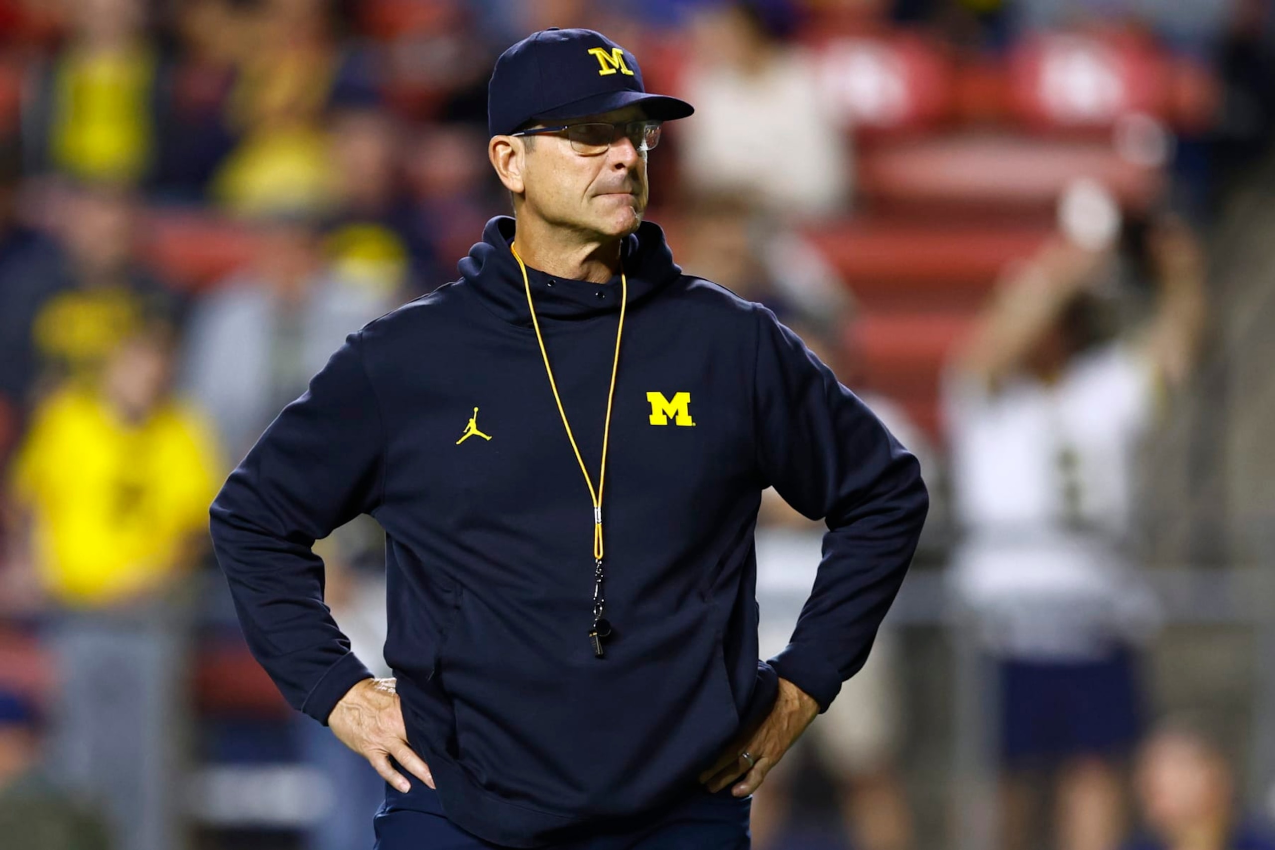 PISCATAWAY, NJ - NOVEMBER 05: Head coach Jim Harbaugh of the Michigan Wolverines before a game against the Rutgers Scarlet Knights at SHI Stadium on November 5, 2022 in Piscataway, New Jersey. (Photo by Rich Schultz/Getty Images) PISCATAWAY, NJ - NOVEMBER 05: Head coach Jim Harbaugh of the Michigan Wolverines before a game against the Rutgers Scarlet Knights at SHI Stadium on November 5, 2022 in Piscataway, New Jersey. (Photo by Rich Schultz/Getty Images)