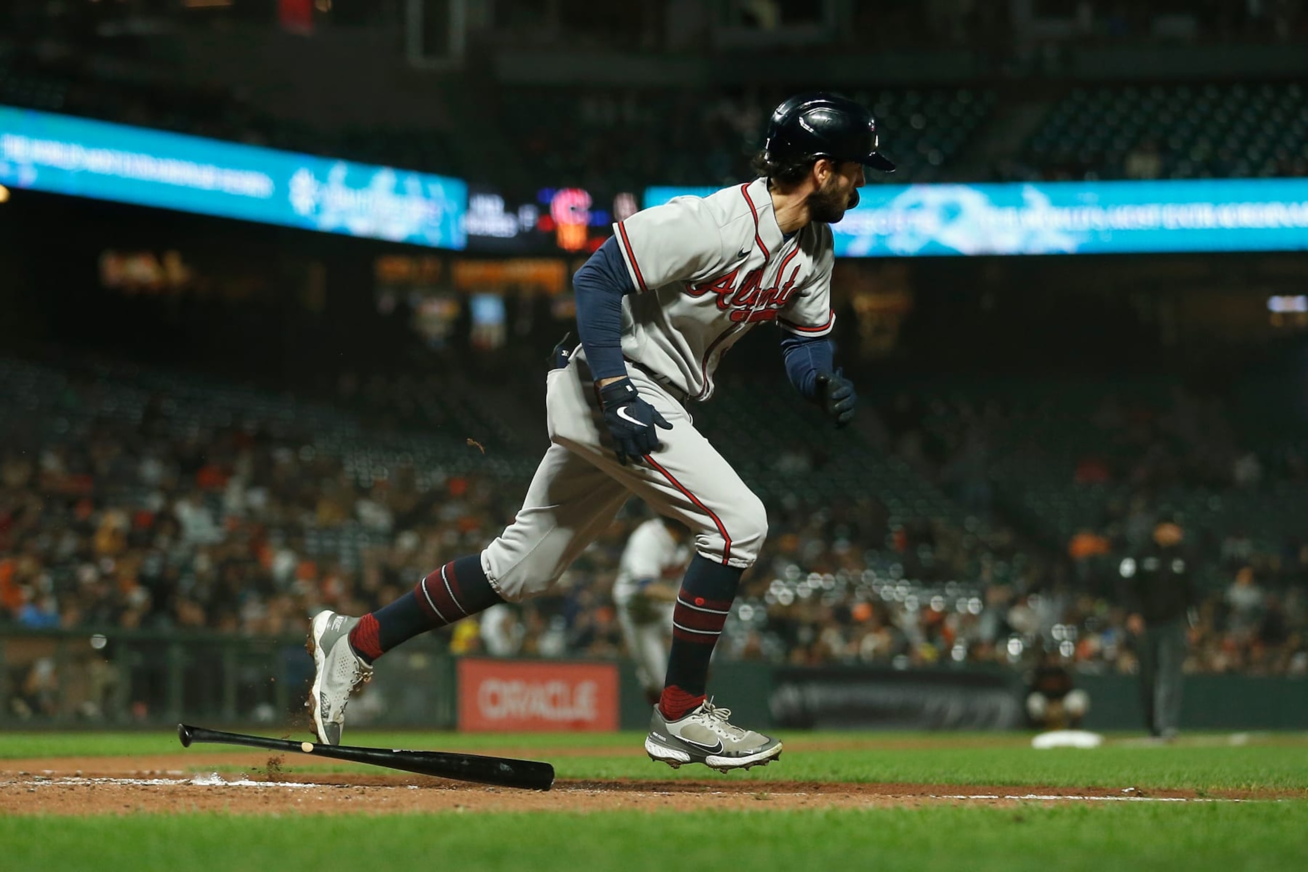 SAN FRANCISCO, CALIFORNIA - SEPTEMBER 12: Dansby Swanson #7 of the Atlanta Braves hits a two-run single in the top of the eighth inning against the San Francisco Giants at Oracle Park on September 12, 2022 in San Francisco, California. (Photo by Lachlan Cunningham/Getty Images)