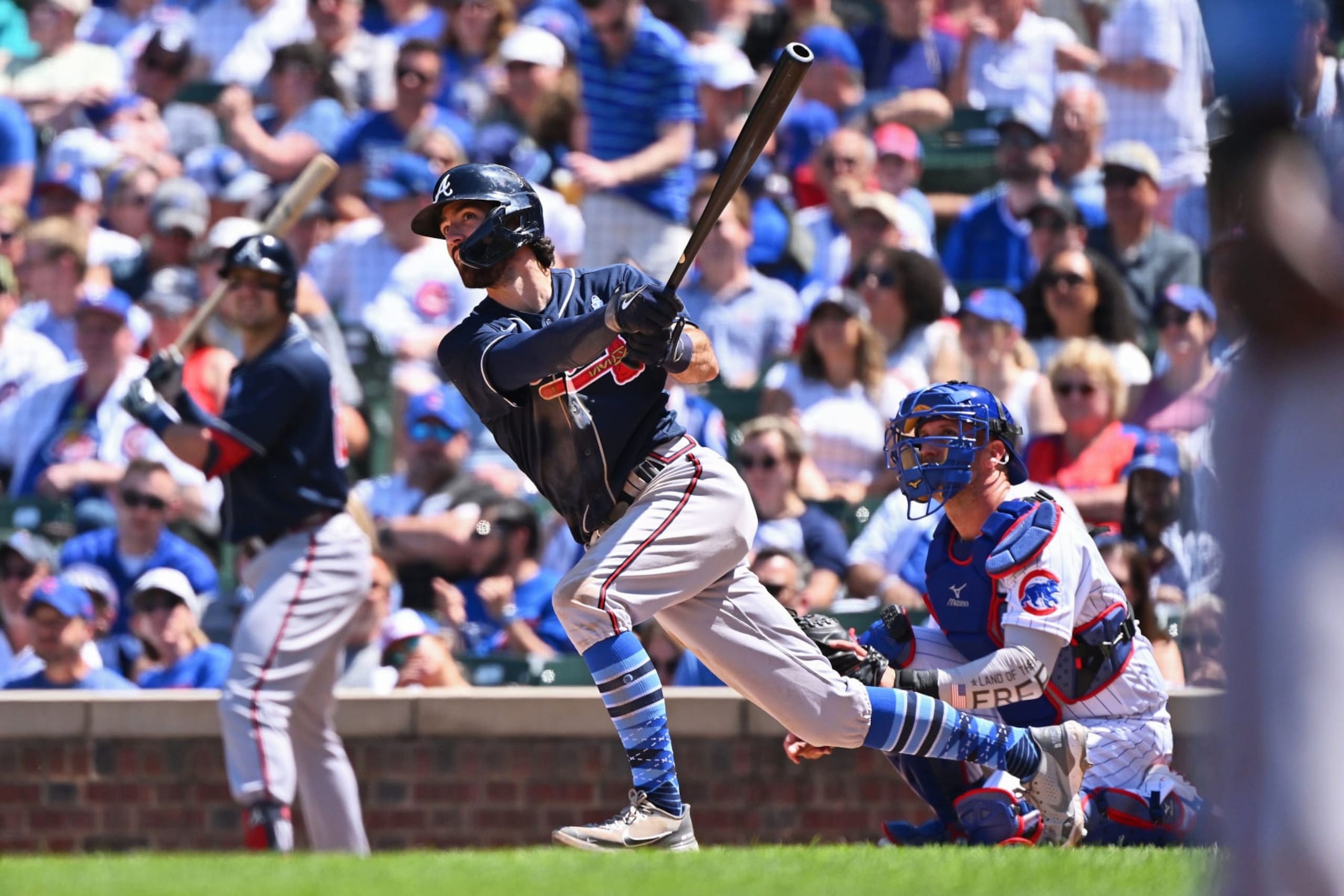 CHICAGO, IL - JUNE 19:  Dansby Swanson #7 of the Atlanta Braves bats against the Chicago Cubs at Wrigley Field on June 19, 2022 in Chicago, Illinois.  (Photo by Jamie Sabau/Getty Images)
