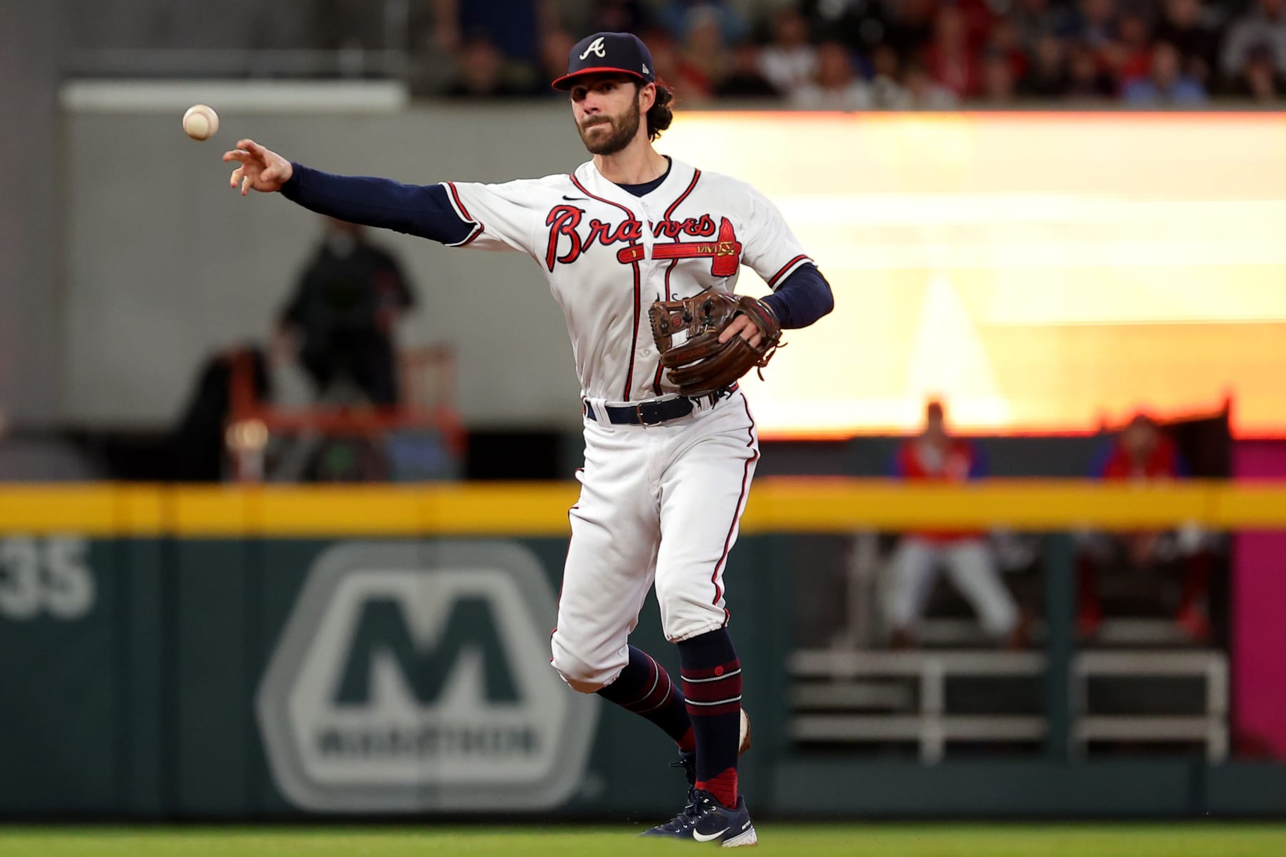 ATLANTA, GEORGIA - OCTOBER 12: Dansby Swanson #7 of the Atlanta Braves throws to first base against the Philadelphia Phillies during the third inning in game two of the National League Division Series at Truist Park on October 12, 2022 in Atlanta, Georgia. (Photo by Kevin C. Cox/Getty Images)