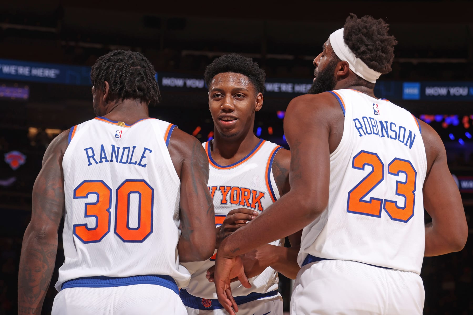 NEW YORK, NY - OCTOBER 14: RJ Barrett #9, Julius Randle #30 and Mitchell Robinson #23 of the New York Knicks huddle up against the Washington Wizards during a preseason game on October 14, 2022 at Madison Square Garden in New York City, New York. NOTE TO USER: User expressly acknowledges and agrees that, by downloading and or using this photograph, User is consenting to the terms and conditions of the Getty Images License Agreement. Mandatory Copyright Notice: Copyright 2022 NBAE (Photo by Nathaniel S. Butler/NBAE via Getty Images)