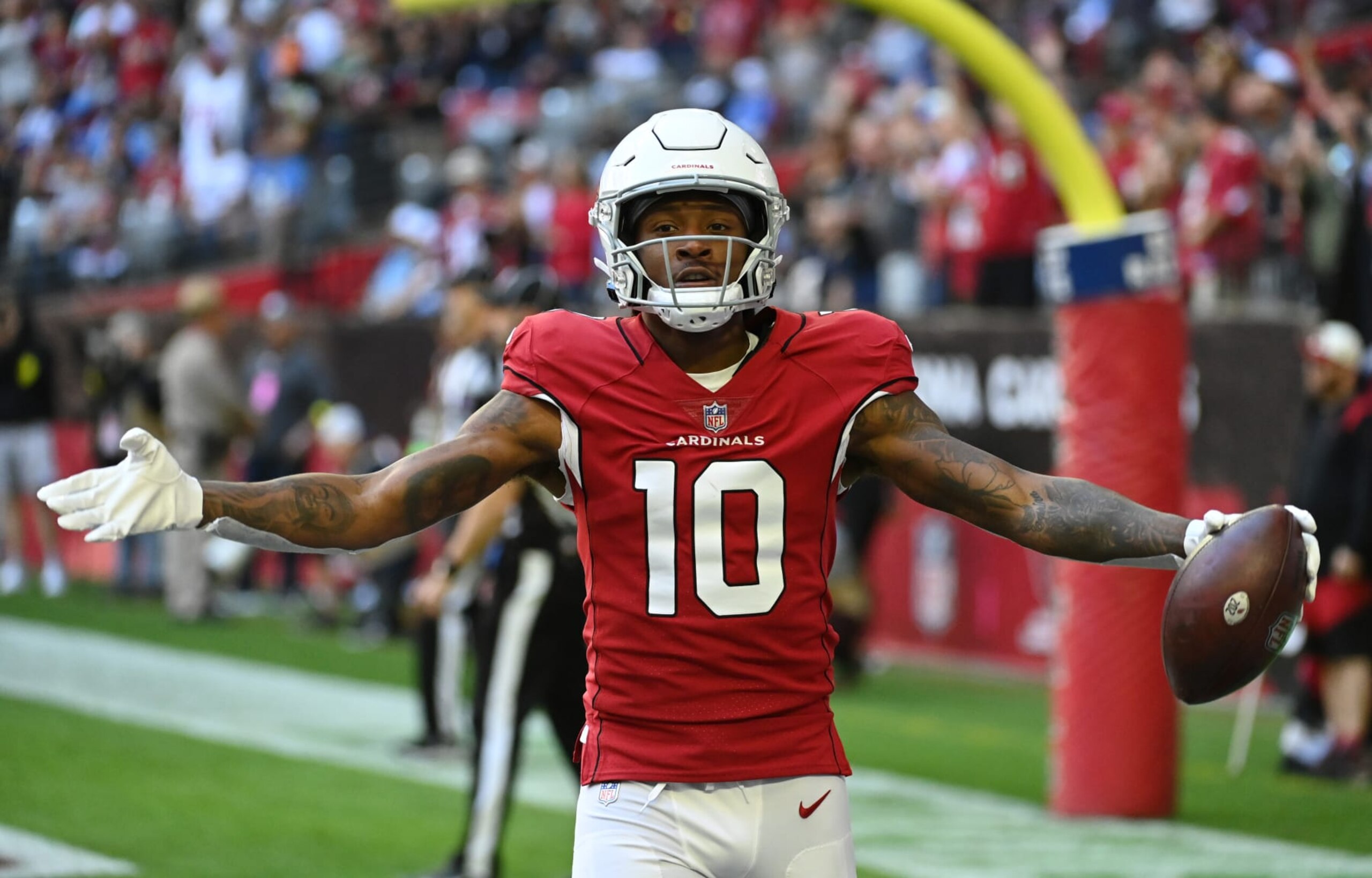 GLENDALE, ARIZONA - NOVEMBER 27: DeAndre Hopkins #10 of the Arizona Cardinals celebrates after catching a touch down pass against the Los Angeles Chargers at State Farm Stadium on November 27, 2022 in Glendale, Arizona. (Photo by Norm Hall/Getty Images) GLENDALE, ARIZONA - NOVEMBER 27: DeAndre Hopkins #10 of the Arizona Cardinals celebrates after catching a touch down pass against the Los Angeles Chargers at State Farm Stadium on November 27, 2022 in Glendale, Arizona. (Photo by Norm Hall/Getty Images)