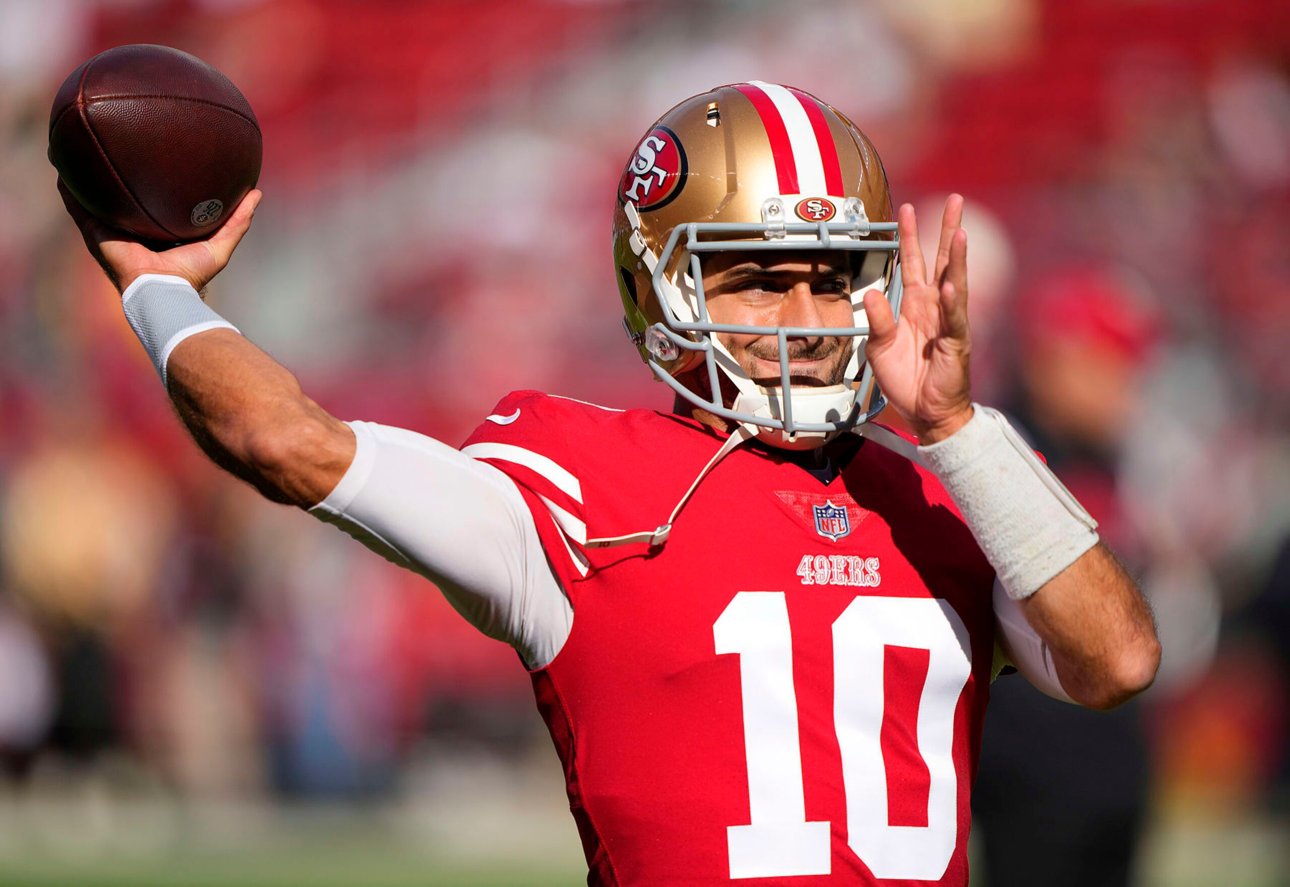 SANTA CLARA, CALIFORNIA - NOVEMBER 27: Jimmy Garoppolo #10 of the San Francisco 49ers warms up prior to the game against the New Orleans Saints at Levi's Stadium on November 27, 2022 in Santa Clara, California. (Photo by Thearon W. Henderson/Getty Images)