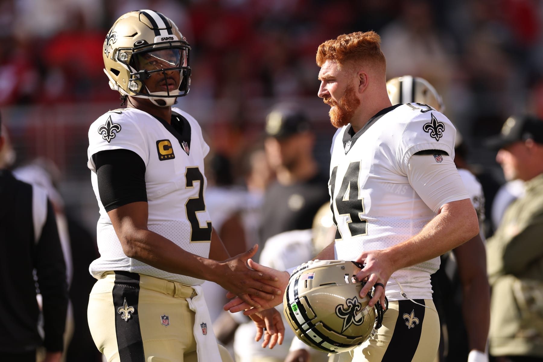 SANTA CLARA, CALIFORNIA - NOVEMBER 27: Jameis Winston #2 of the New Orleans Saints shakes hands with Andy Dalton #14 during warm ups prior to the game against the San Francisco 49ers at Levi's Stadium on November 27, 2022 in Santa Clara, California. (Photo by Ezra Shaw/Getty Images)