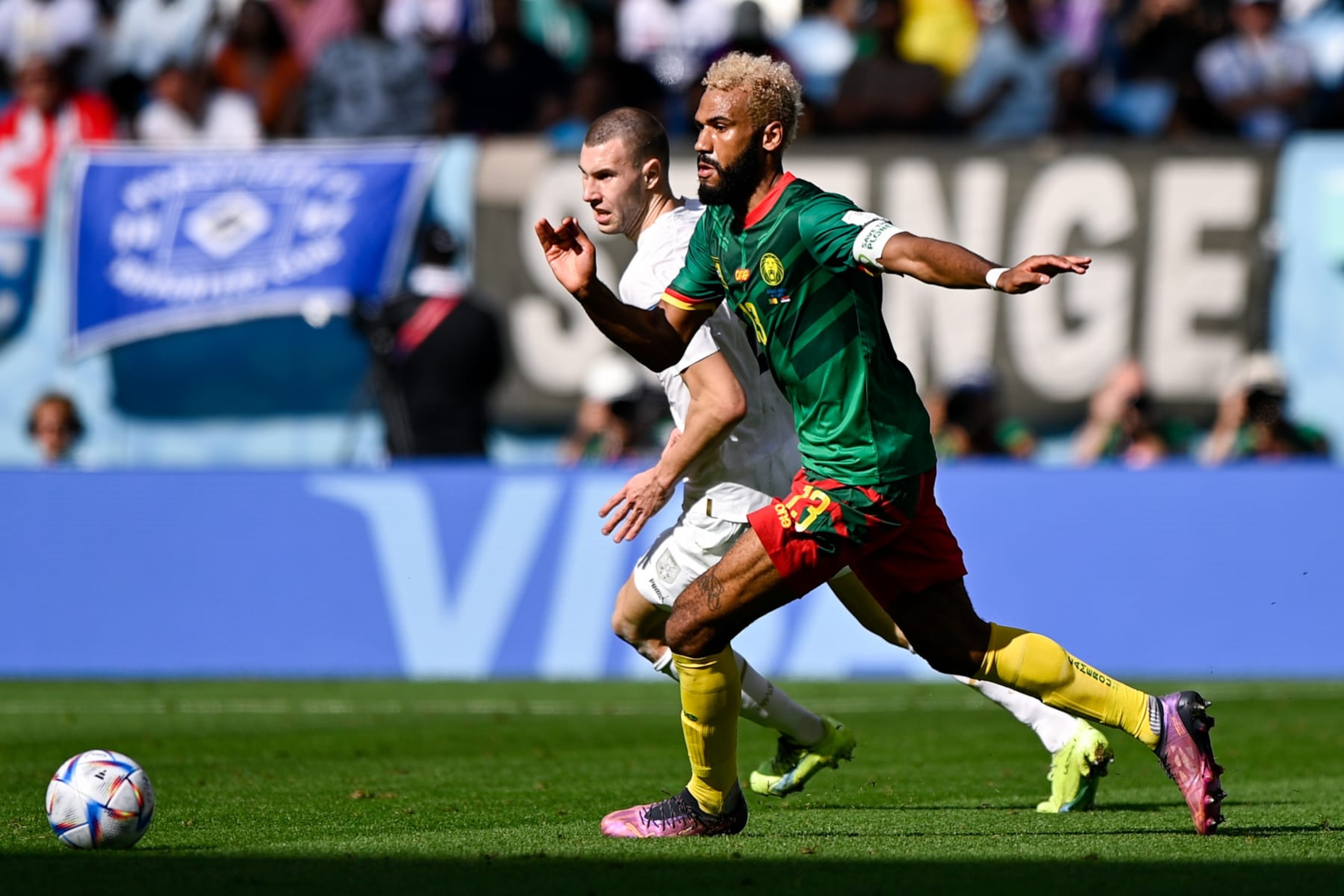 AL WAKRAH, QATAR - NOVEMBER 28: Eric Maxim Choupo Moting of Cameroon battles for the ball with Sergej Milinkovic-Savic of Serbia during the Group G - FIFA World Cup Qatar 2022 match between Cameroon and Serbia at the Al Janoub Stadium on November 28, 2022 in Al Wakrah, Qatar (Photo by Pablo Morano/BSR Agency/Getty Images)