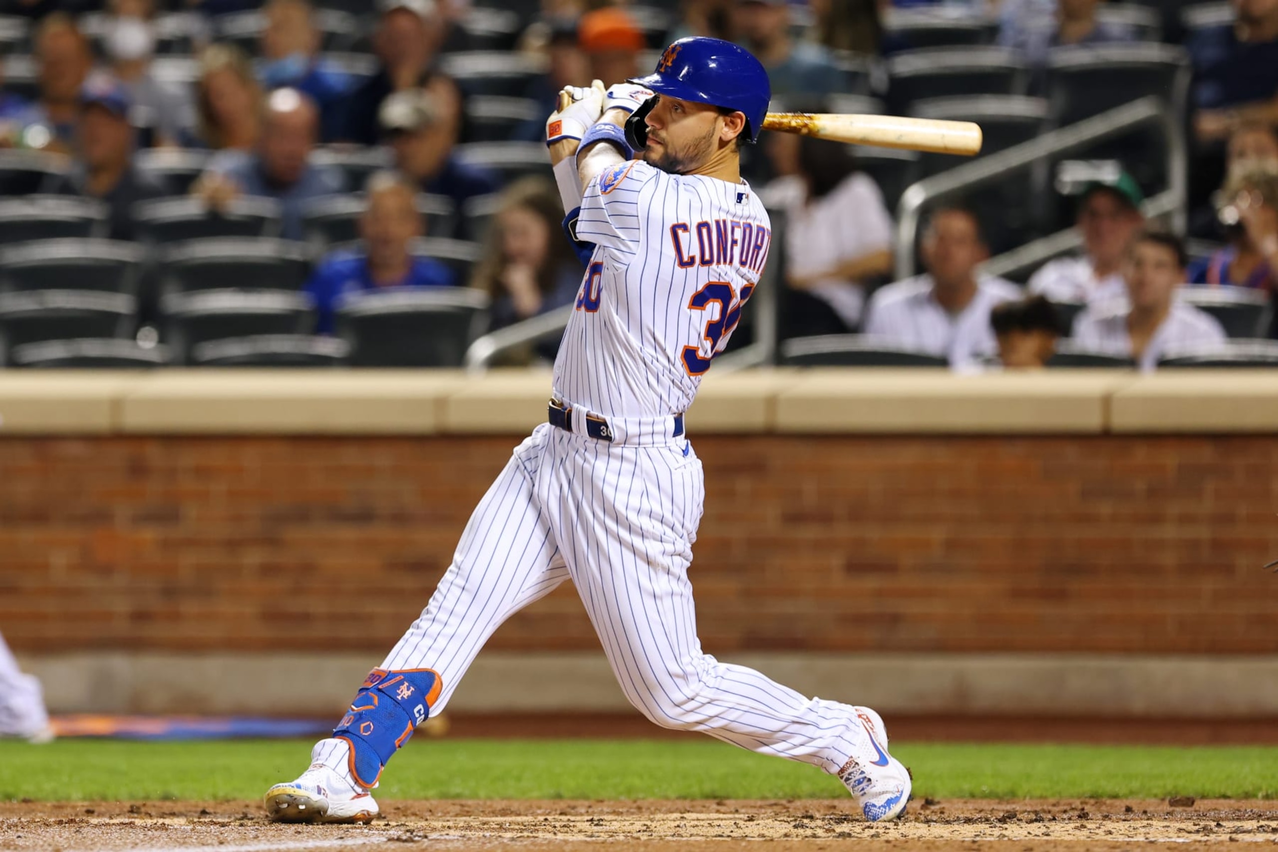 NEW YORK, NY - SEPTEMBER 12: Michael Conforto #30 of the New York Mets in action against the New York Yankees during a game at Citi Field on September 12, 2021 in New York City. (Photo by Rich Schultz/Getty Images)