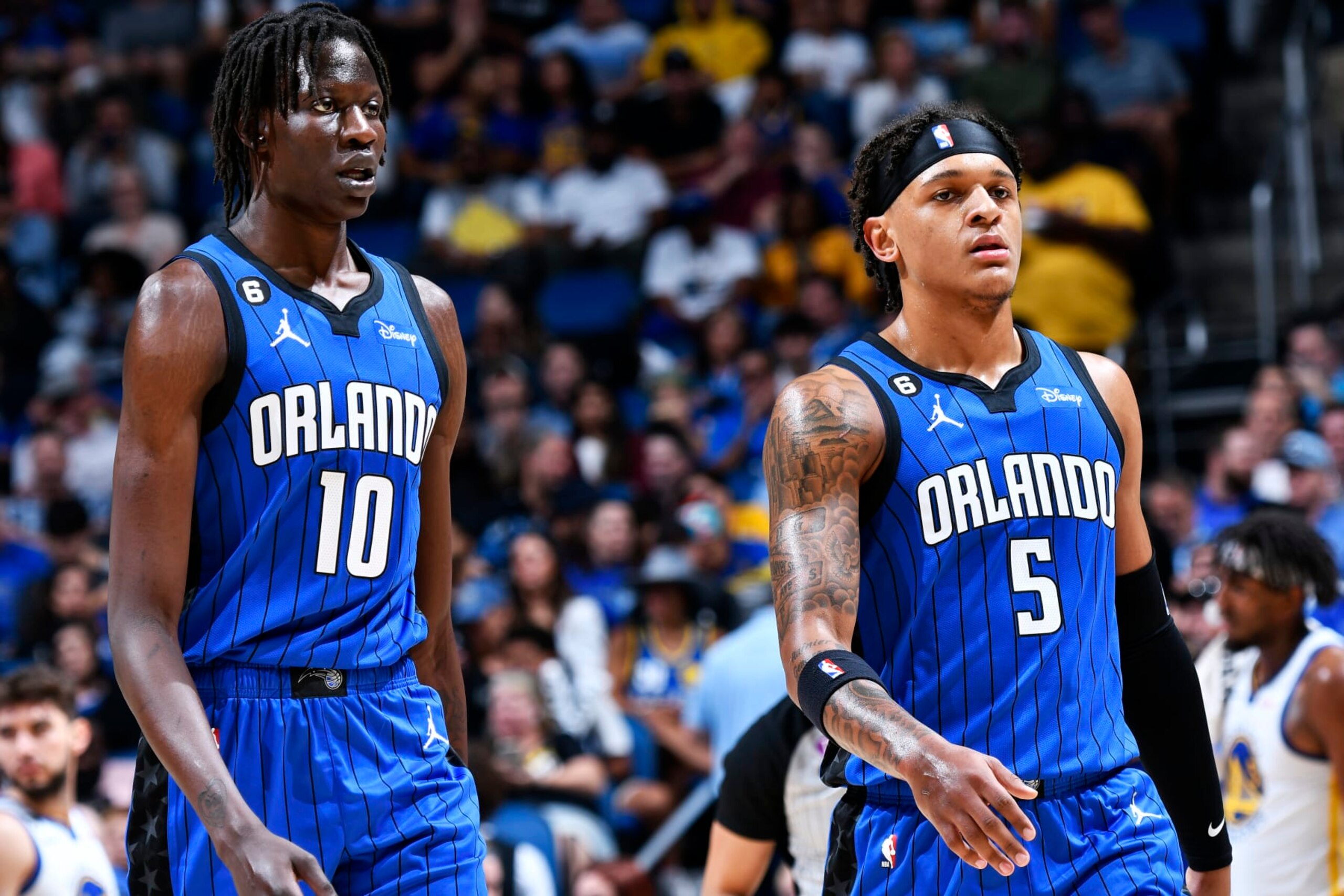 ORLANDO, FL - NOVEMBER 2: Bol Bol #10 of the Orlando Magic and Paolo Banchero #5 stand on the court during the game against the Golden State Warriors on November 2, 2022 at Amway Center in Orlando, Florida. NOTE TO USER: User expressly acknowledges and agrees that, by downloading and or using this photograph, User is consenting to the terms and conditions of the Getty Images License Agreement. Mandatory Copyright Notice: Copyright 2022 NBAE (Photo by Fernando Medina/NBAE via Getty Images)