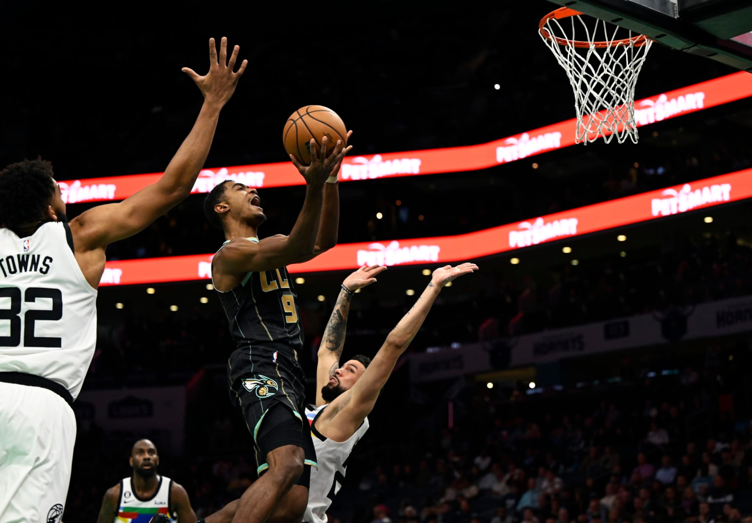 CHARLOTTE, NORTH CAROLINA - NOVEMBER 25: Theo Maledon #9 of the Charlotte Hornets gets fouled on the way to the basket against the Minnesota Timberwolves in the first quarter at Spectrum Center on November 25, 2022 in Charlotte, North Carolina. NOTE TO USER: User expressly acknowledges and agrees that, by downloading and or using this photograph, User is consenting to the terms and conditions of the Getty Images License Agreement. (Photo by Eakin Howard/Getty Images) CHARLOTTE, NORTH CAROLINA - NOVEMBER 25: Theo Maledon #9 of the Charlotte Hornets gets fouled on the way to the basket against the Minnesota Timberwolves in the first quarter at Spectrum Center on November 25, 2022 in Charlotte, North Carolina. NOTE TO USER: User expressly acknowledges and agrees that, by downloading and or using this photograph, User is consenting to the terms and conditions of the Getty Images License Agreement. (Photo by Eakin Howard/Getty Images)