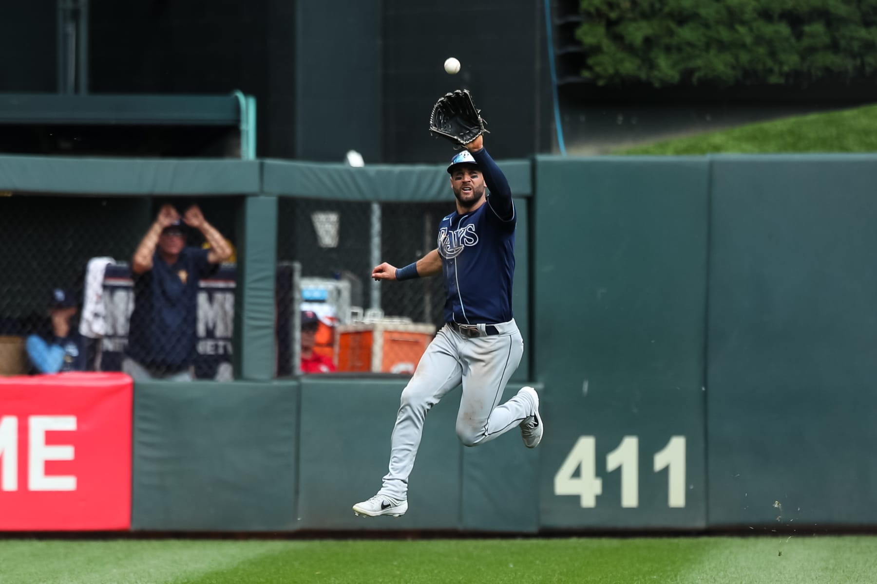 MINNEAPOLIS, MN - JUNE 11: Kevin Kiermaier #39 of the Tampa Bay Rays jumps to catch a fly ball hit by Jose Miranda #64 of the Minnesota Twins for an out in the fourth inning of the game at Target Field on June 11, 2022 in Minneapolis, Minnesota. The Twins defeated the Rays 6-5. (Photo by David Berding/Getty Images)