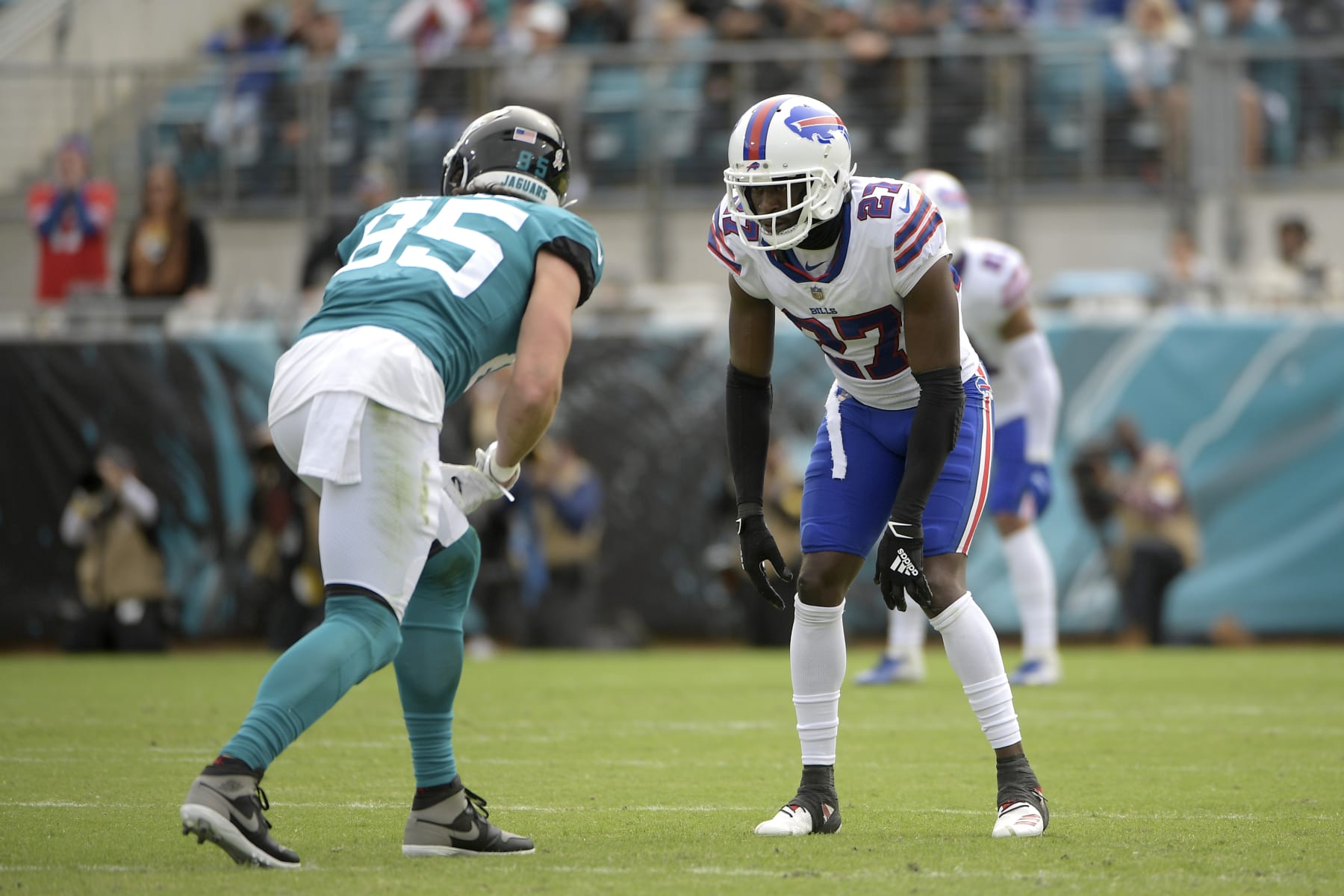 Buffalo Bills cornerback Tre'Davious White (27) follows Jacksonville Jaguars tight end Dan Arnold (85) during the first half of an NFL football game, Sunday, Nov. 7, 2021, in Jacksonville, Fla. (AP Photo/Phelan M. Ebenhack)