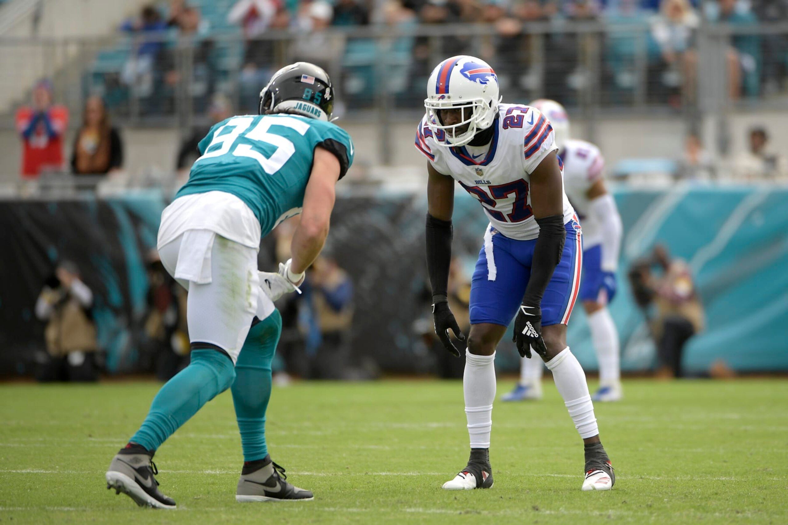 Buffalo Bills cornerback Tre'Davious White (27) follows Jacksonville Jaguars tight end Dan Arnold (85) during the first half of an NFL football game, Sunday, Nov. 7, 2021, in Jacksonville, Fla. (AP Photo/Phelan M. Ebenhack)
