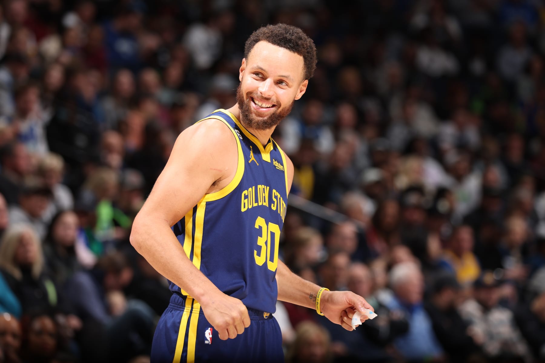 MINNEAPOLIS, MN -  NOVEMBER 27: Stephen Curry #30 of the Golden State Warriors smiles during the game against the Minnesota Timberwolves on November 27, 2022 at Target Center in Minneapolis, Minnesota. NOTE TO USER: User expressly acknowledges and agrees that, by downloading and or using this Photograph, user is consenting to the terms and conditions of the Getty Images License Agreement. Mandatory Copyright Notice: Copyright 2022 NBAE (Photo by David Sherman/NBAE via Getty Images)