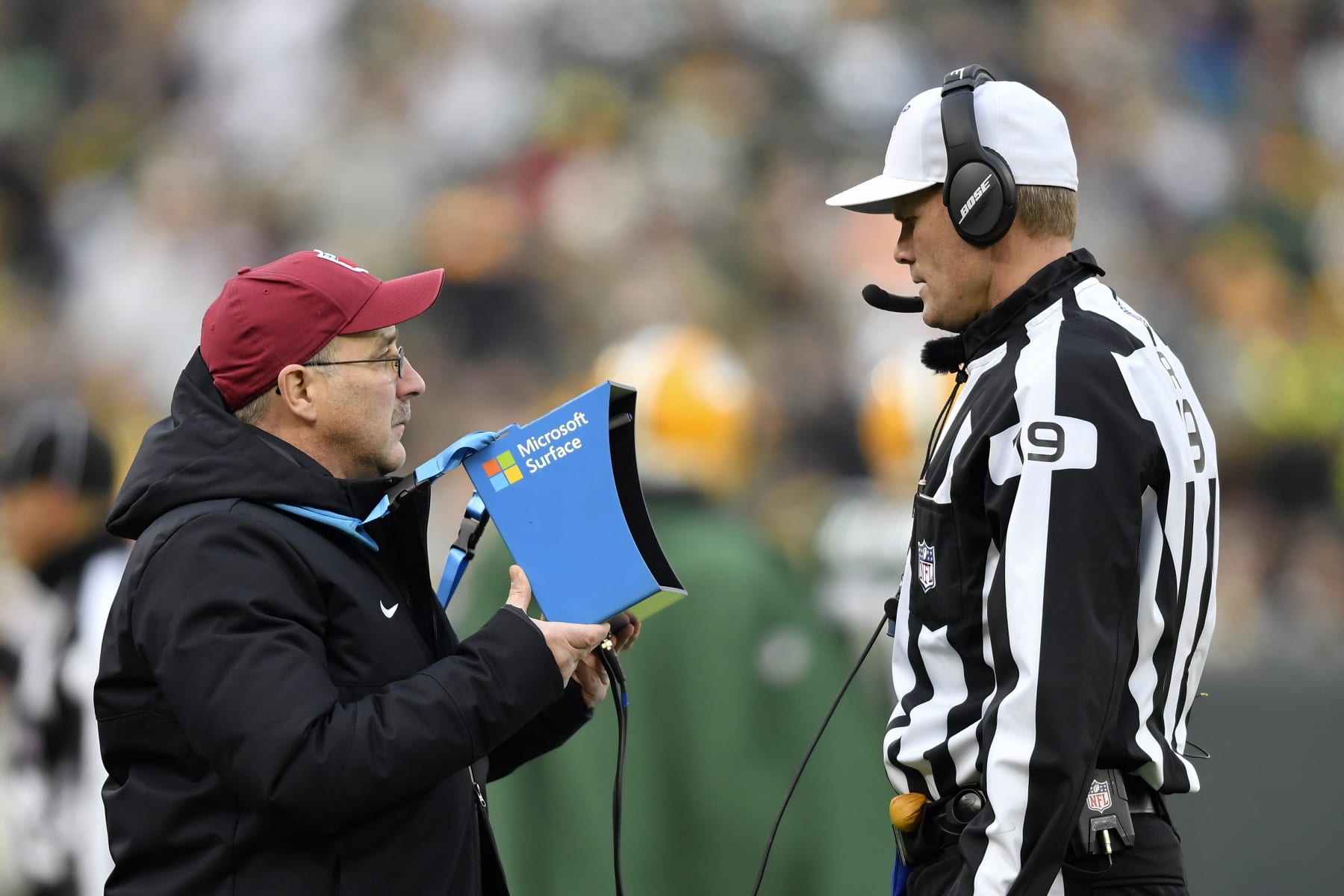 GREEN BAY, WISCONSIN - DECEMBER 08: Referee Clay Martin #19 reviews the instant replay in the second half of the game between the Green Bay Packers and the Washington Redskins at Lambeau Field on December 08, 2019 in Green Bay, Wisconsin. (Photo by Quinn Harris/Getty Images)