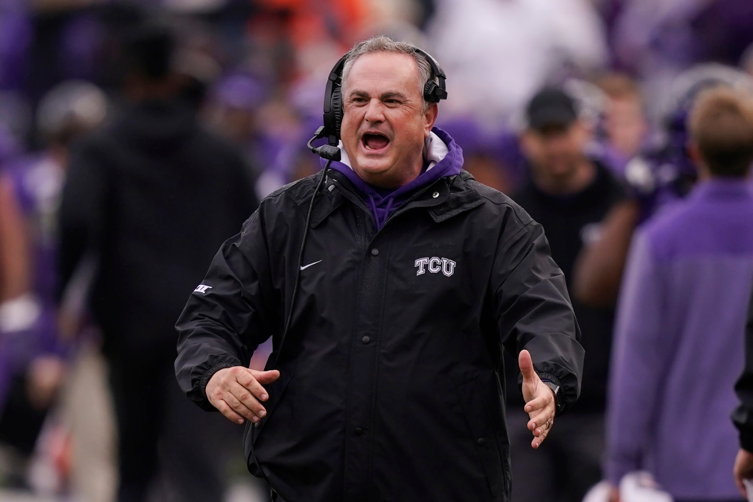 TCU head coach Sonny Dykes cheers after his team scored during the first half of an NCAA college football game against Iowa State in Fort Worth, Texas, Saturday, Nov. 26, 2022. (AP Photo/LM Otero)