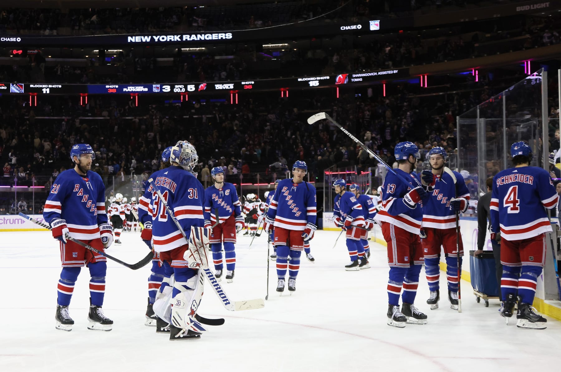 NEW YORK, NEW YORK - NOVEMBER 28: The New York Rangers leave the ice following a 5-3 loss to the New Jersey Devils at Madison Square Garden on November 28, 2022 in New York City. (Photo by Bruce Bennett/Getty Images)