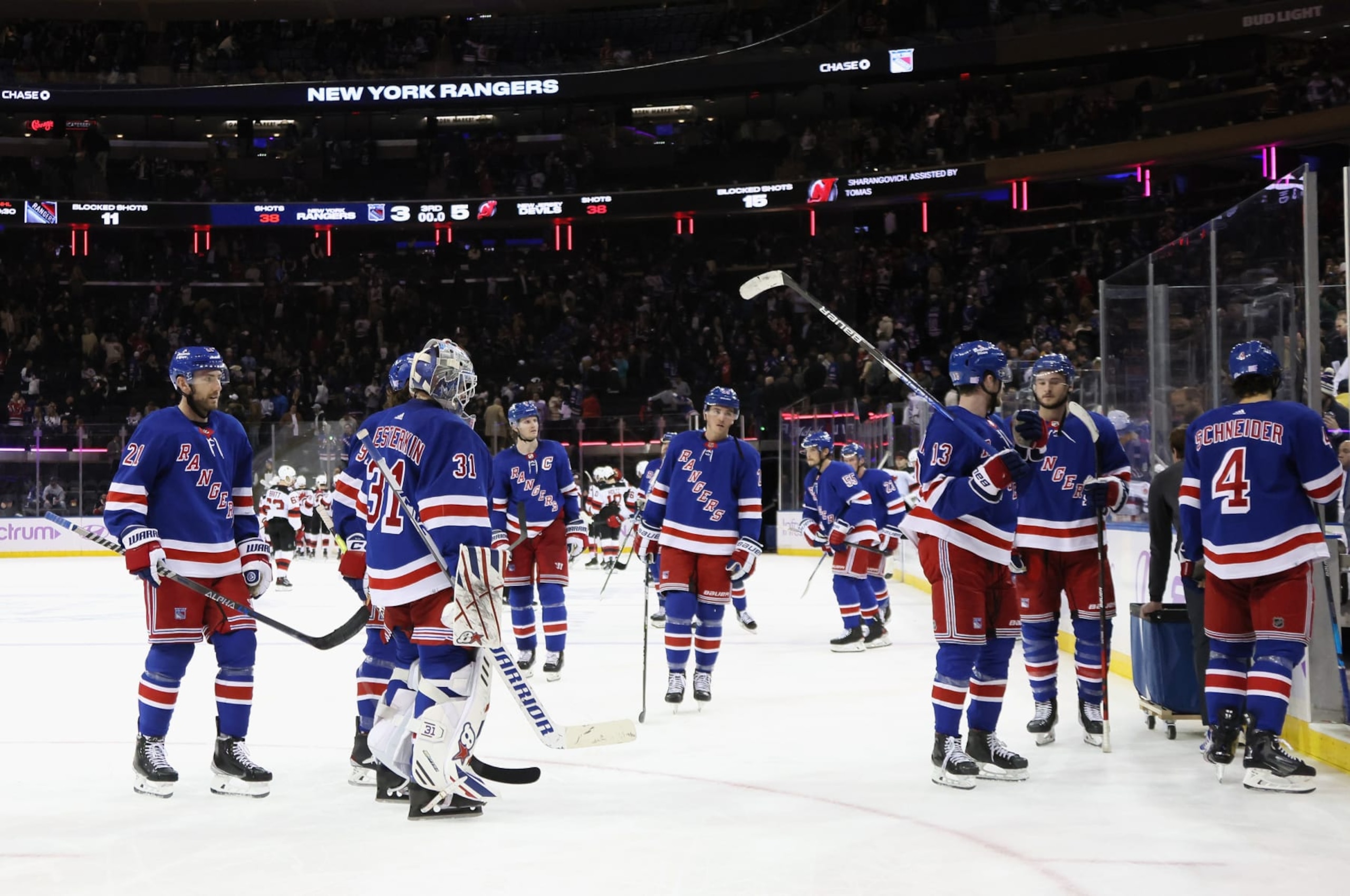 NEW YORK, NEW YORK - NOVEMBER 28: The New York Rangers leave the ice following a 5-3 loss to the New Jersey Devils at Madison Square Garden on November 28, 2022 in New York City. (Photo by Bruce Bennett/Getty Images)
