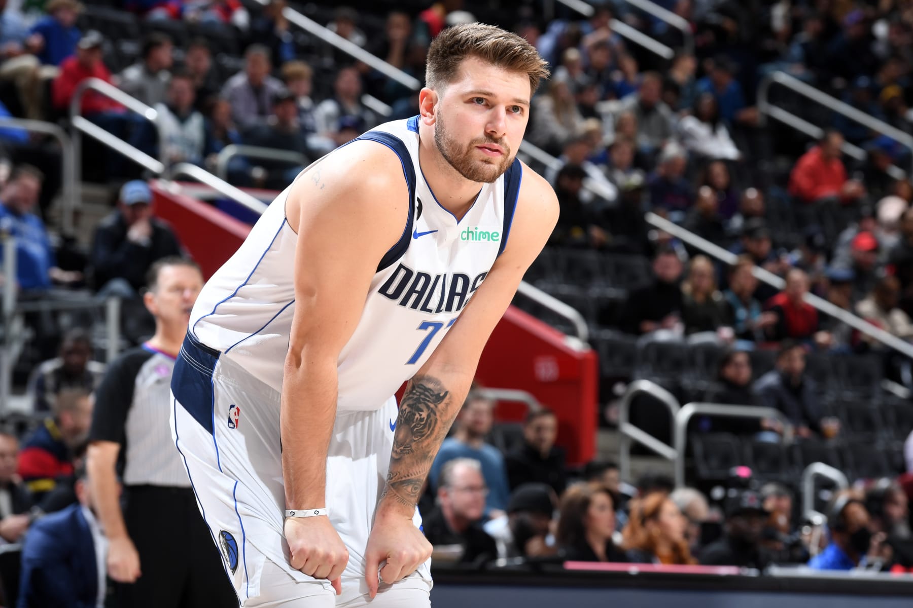 DETROIT, MI - DECEMBER 1: Luka Doncic #77 of the Dallas Mavericks looks on during the game against the Detroit Pistons on December 1, 2022 at Little Caesars Arena in Detroit, Michigan. NOTE TO USER: User expressly acknowledges and agrees that, by downloading and/or using this photograph, User is consenting to the terms and conditions of the Getty Images License Agreement. Mandatory Copyright Notice: Copyright 2022 NBAE (Photo by Chris Schwegler/NBAE via Getty Images)