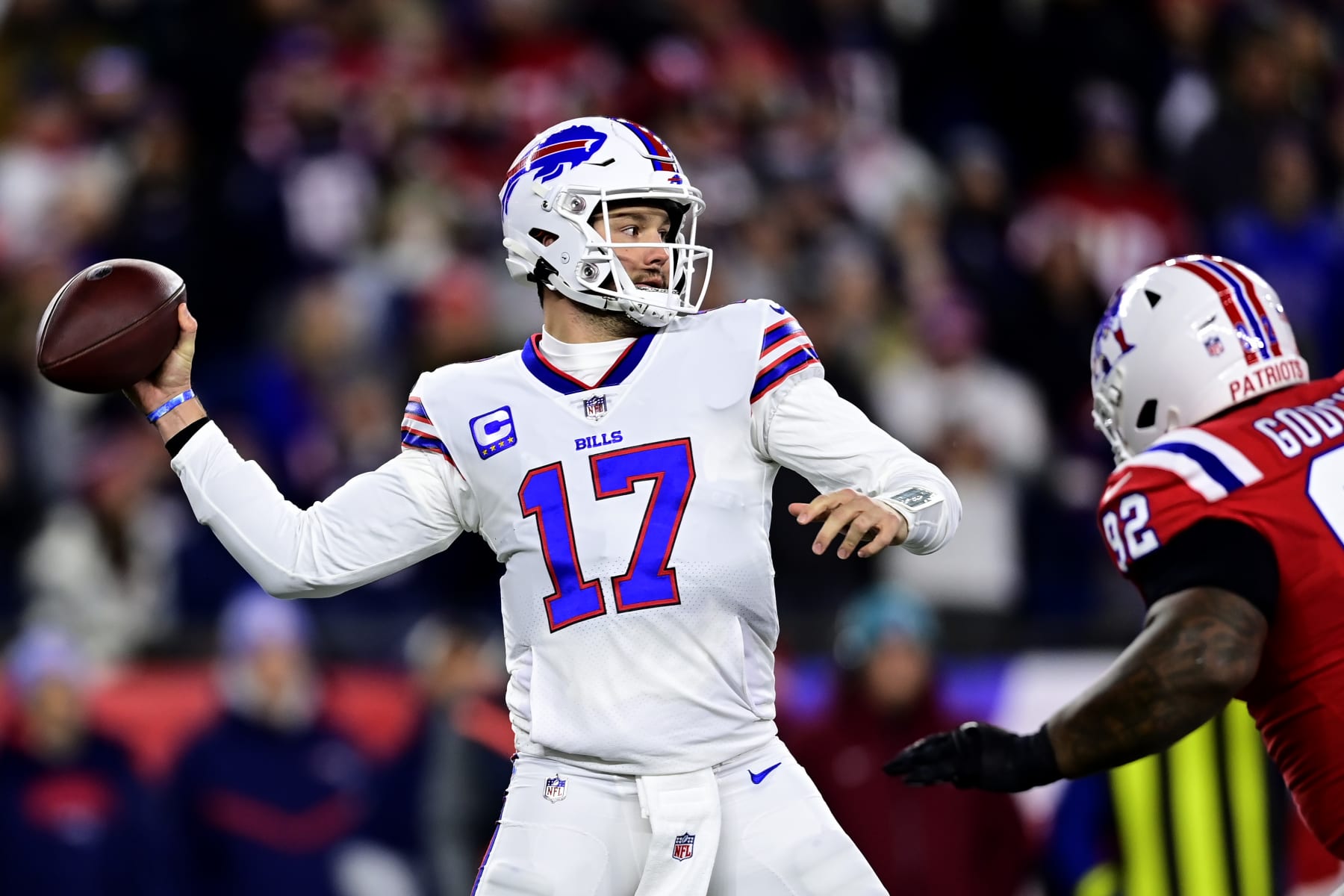 FOXBOROUGH, MASSACHUSETTS - DECEMBER 01: Quarterback Josh Allen #17 of the Buffalo Bills drops back to pass in the first quarter against the New England Patriots at Gillette Stadium on December 01, 2022 in Foxborough, Massachusetts. (Photo by Billie Weiss/Getty Images)