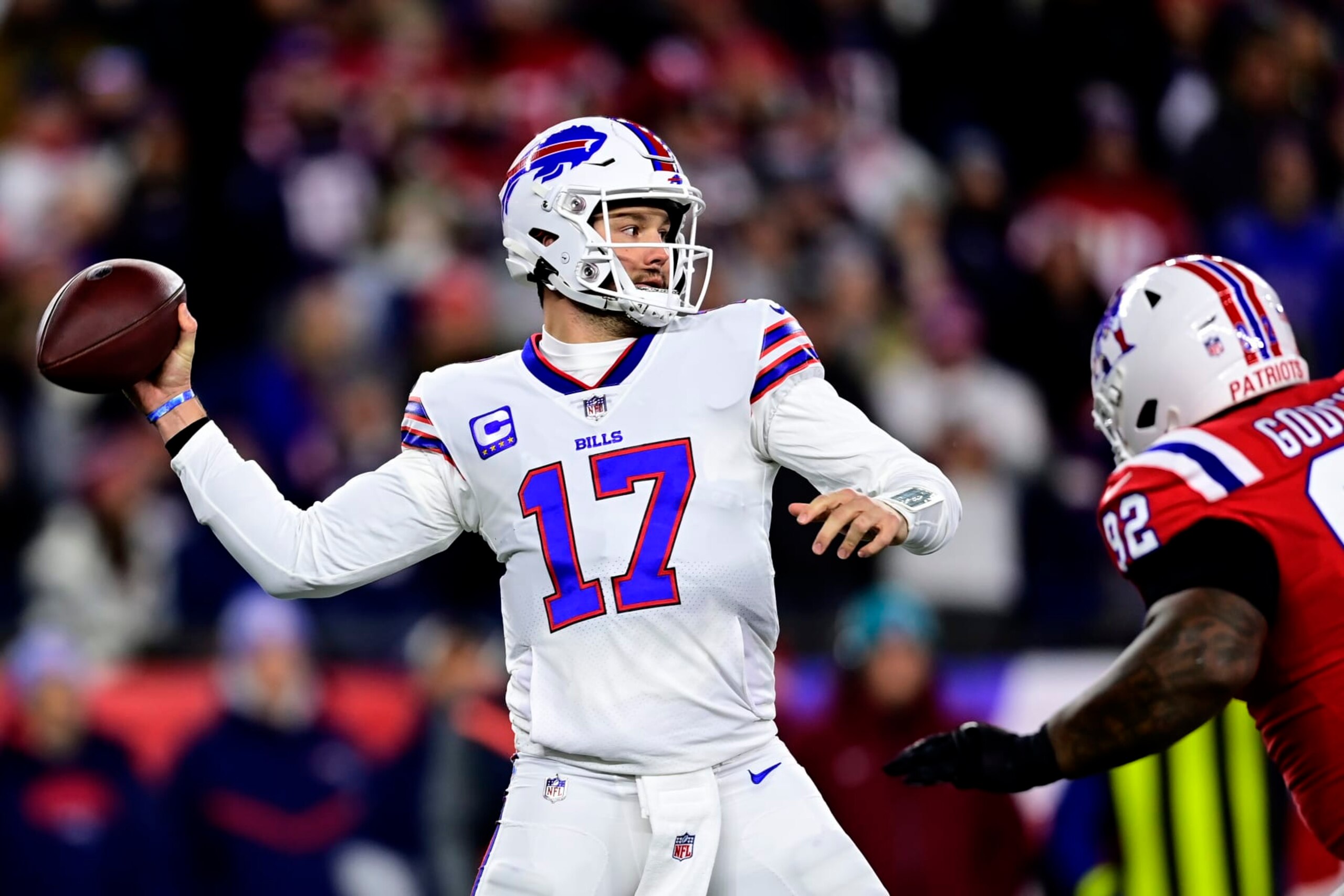 FOXBOROUGH, MASSACHUSETTS - DECEMBER 01: Quarterback Josh Allen #17 of the Buffalo Bills drops back to pass in the first quarter against the New England Patriots at Gillette Stadium on December 01, 2022 in Foxborough, Massachusetts. (Photo by Billie Weiss/Getty Images)
