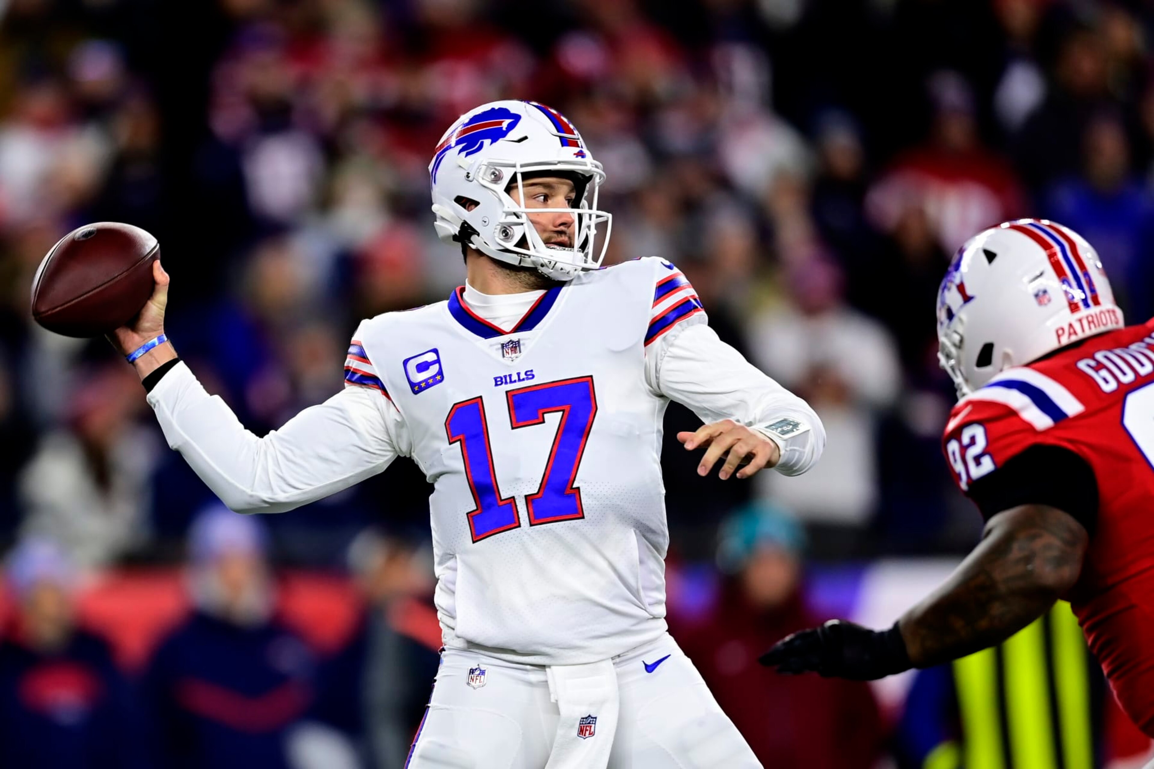 FOXBOROUGH, MASSACHUSETTS - DECEMBER 01: Quarterback Josh Allen #17 of the Buffalo Bills drops back to pass in the first quarter against the New England Patriots at Gillette Stadium on December 01, 2022 in Foxborough, Massachusetts. (Photo by Billie Weiss/Getty Images) FOXBOROUGH, MASSACHUSETTS - DECEMBER 01: Quarterback Josh Allen #17 of the Buffalo Bills drops back to pass in the first quarter against the New England Patriots at Gillette Stadium on December 01, 2022 in Foxborough, Massachusetts. (Photo by Billie Weiss/Getty Images)