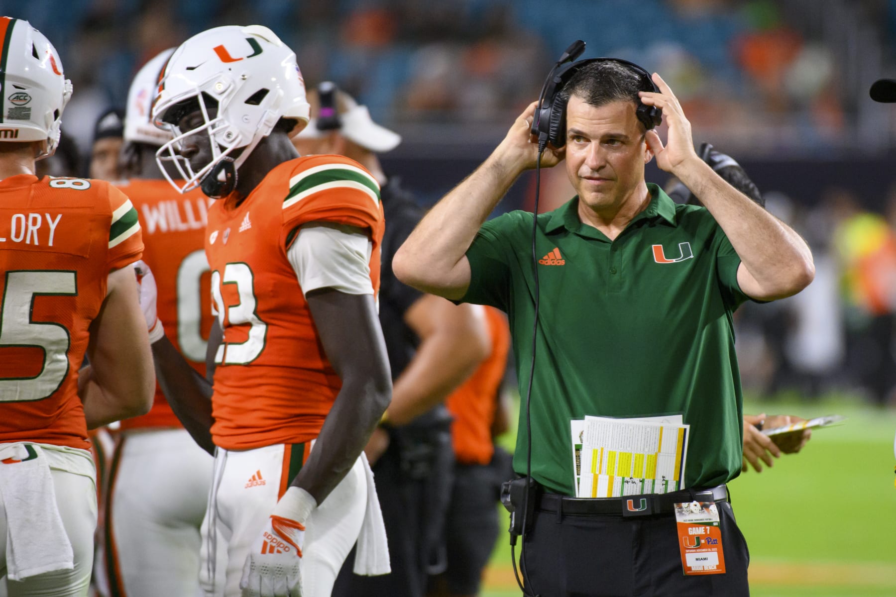 MIAMI GARDENS, FL - NOVEMBER 26: Miami head coach Mario Cristobal walks on the field during a timeout during an college football game between the Pittsburgh Panthers and the University of Miami Hurricanes on November 26, 2022 at the Hard Rock Stadium in Miami Gardens, FL. (Photo by Doug Murray/Icon Sportswire via Getty Images)