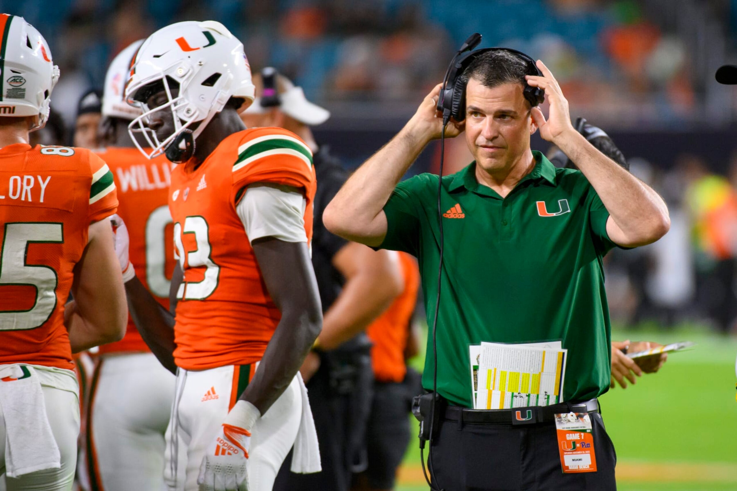 MIAMI GARDENS, FL - NOVEMBER 26: Miami head coach Mario Cristobal walks on the field during a timeout during an college football game between the Pittsburgh Panthers and the University of Miami Hurricanes on November 26, 2022 at the Hard Rock Stadium in Miami Gardens, FL. (Photo by Doug Murray/Icon Sportswire via Getty Images)