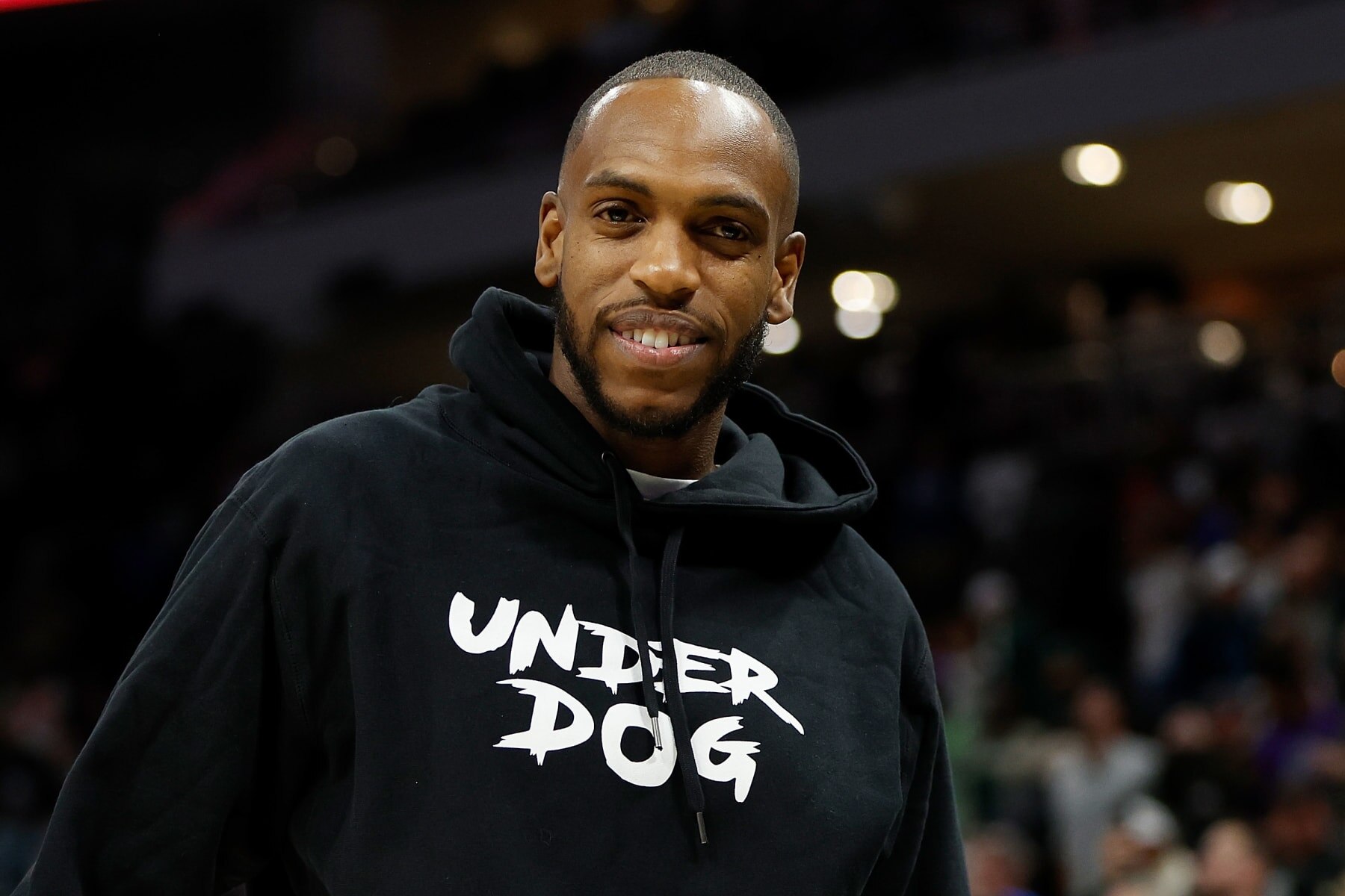 MILWAUKEE, WISCONSIN - OCTOBER 26: Khris Middleton #22 of the Milwaukee Bucks in street clothes as he recovers from an injury after the game against the Brooklyn Nets at Fiserv Forum on October 26, 2022 in Milwaukee, Wisconsin. NOTE TO USER: User expressly acknowledges and agrees that, by downloading and or using this photograph, User is consenting to the terms and conditions of the Getty Images License Agreement. (Photo by John Fisher/Getty Images)