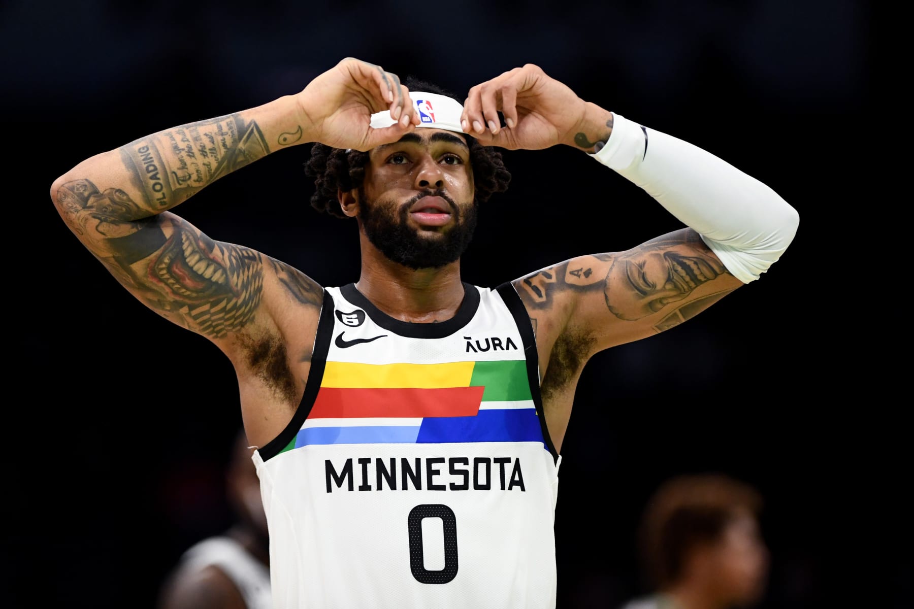 CHARLOTTE, NORTH CAROLINA - NOVEMBER 25: D'Angelo Russell #0 of the Minnesota Timberwolves stands on the court during a time out in the first quarter against the Charlotte Hornets at Spectrum Center on November 25, 2022 in Charlotte, North Carolina. NOTE TO USER: User expressly acknowledges and agrees that, by downloading and or using this photograph, User is consenting to the terms and conditions of the Getty Images License Agreement. (Photo by Eakin Howard/Getty Images)
