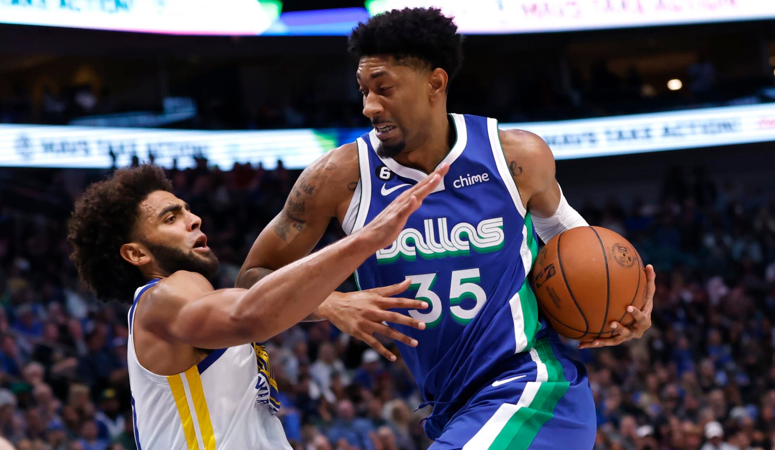 DALLAS, TX - NOVEMBER 29: Christian Wood #35 of the Dallas Mavericks is fouled by Anthony Lamb #40 of the Golden State Warriors in the first half at American Airlines Center on November 29, 2022 in Dallas, Texas. NOTE TO USER: User expressly acknowledges and agrees that, by downloading and or using this photograph, User is consenting to the terms and conditions of the Getty Images License Agreement. (Photo by Ron Jenkins/Getty Images) DALLAS, TX - NOVEMBER 29: Christian Wood #35 of the Dallas Mavericks is fouled by Anthony Lamb #40 of the Golden State Warriors in the first half at American Airlines Center on November 29, 2022 in Dallas, Texas. NOTE TO USER: User expressly acknowledges and agrees that, by downloading and or using this photograph, User is consenting to the terms and conditions of the Getty Images License Agreement. (Photo by Ron Jenkins/Getty Images)