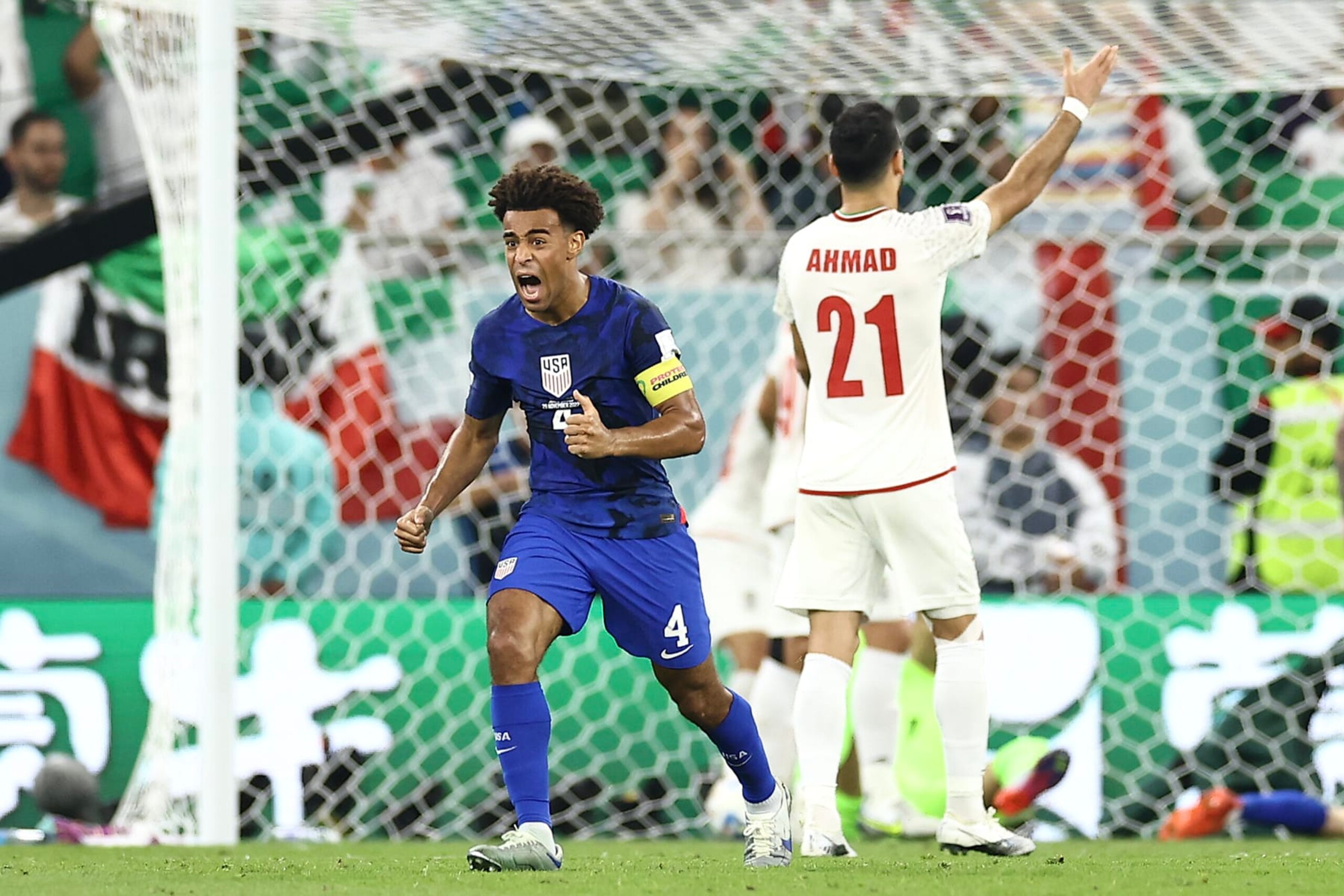 DOHA, QATAR - NOVEMBER 29: Tyler Adams of United States reacts following the team's first goal during the FIFA World Cup Qatar 2022 Group B match between IR Iran and USA at Al Thumama Stadium on November 29, 2022 in Doha, Qatar. (Photo by Tim Nwachukwu/Getty Images)