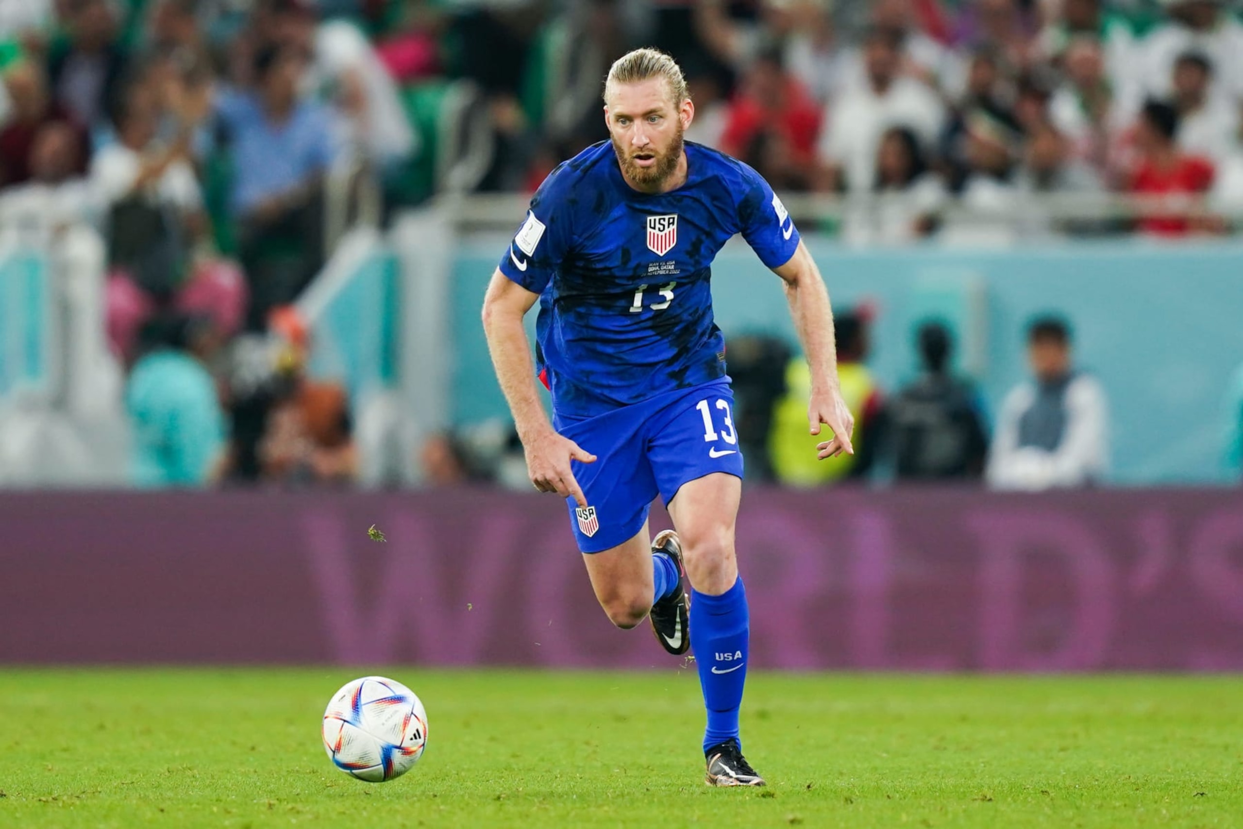 DOHA, QATAR - NOVEMBER 29:  Tim Ream of United States drives the ball during the FIFA World Cup Qatar 2022 Group B match between IR Iran and USA at Al Thumama Stadium on November 29, 2022 in Doha, Qatar. (Photo by Khalil Bashar/Jam Media/Getty Images)