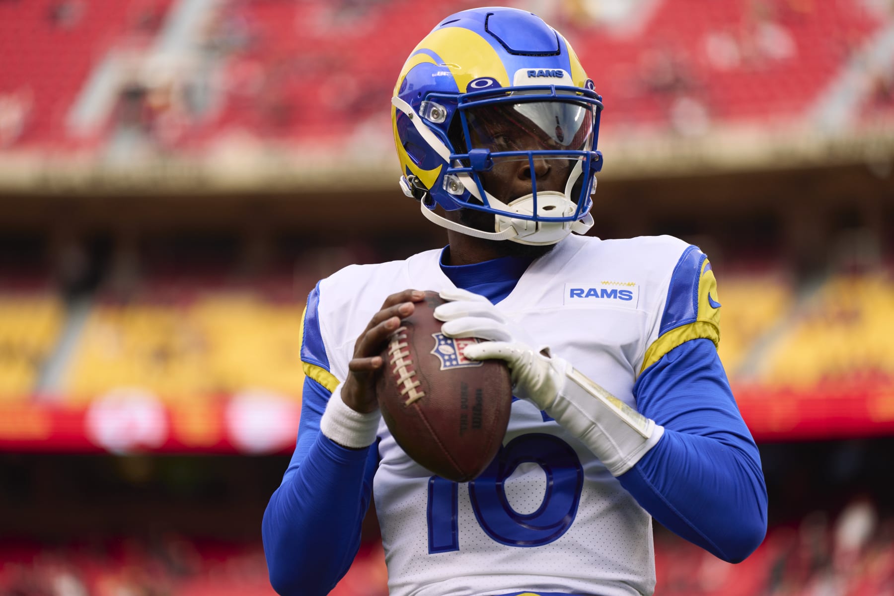 KANSAS CITY, MO - NOVEMBER 27: Bryce Perkins #16 of the Los Angeles Rams warms up before kickoff against the Kansas City Chiefs at GEHA Field at Arrowhead Stadium on November 27, 2022 in Kansas City, Missouri. (Photo by Cooper Neill/Getty Images)