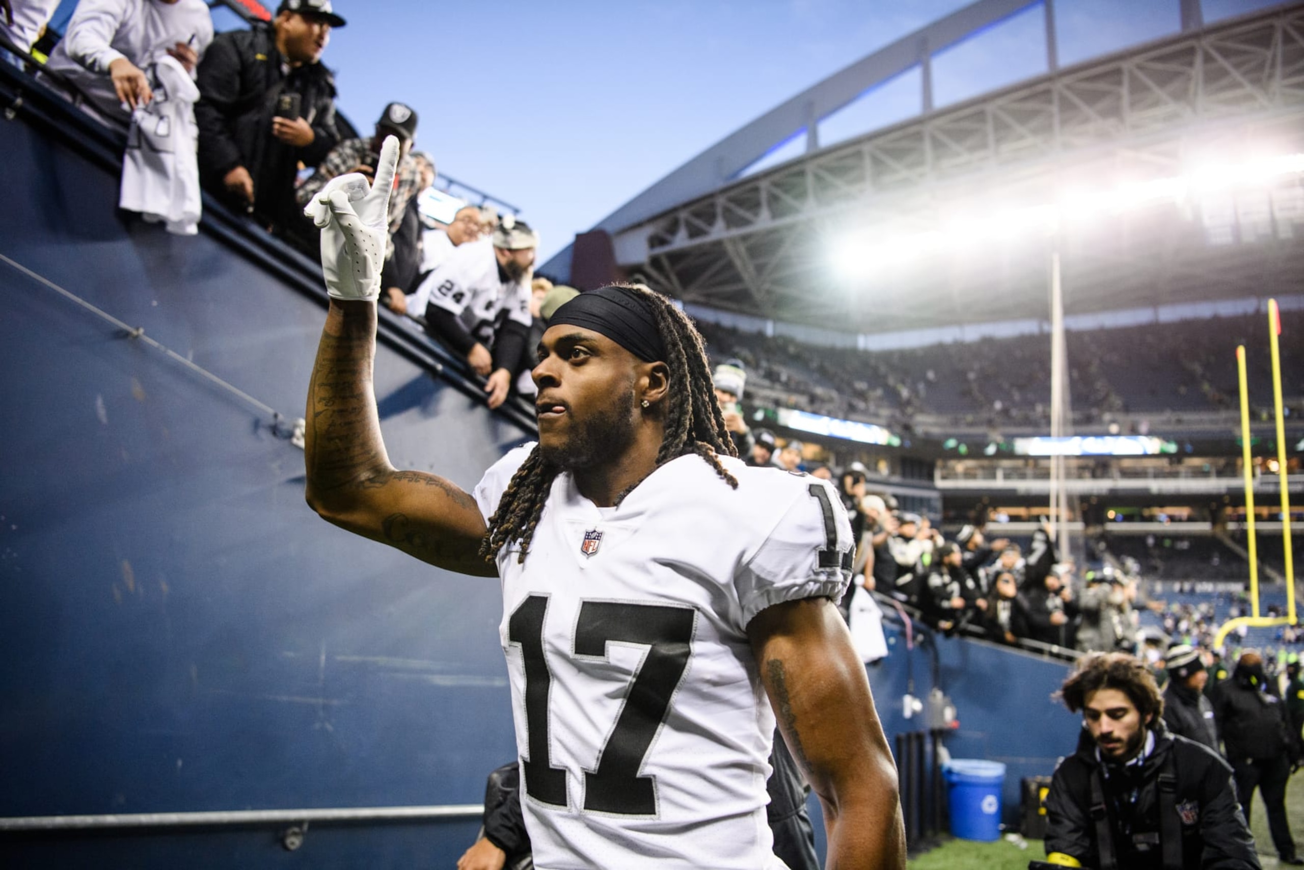 SEATTLE, WASHINGTON - NOVEMBER 27: Davante Adams #17 of the Las Vegas Raiders celebrates after beating the Seattle Seahawks 40-34 in overtime  at Lumen Field on November 27, 2022 in Seattle, Washington. (Photo by Jane Gershovich/Getty Images)