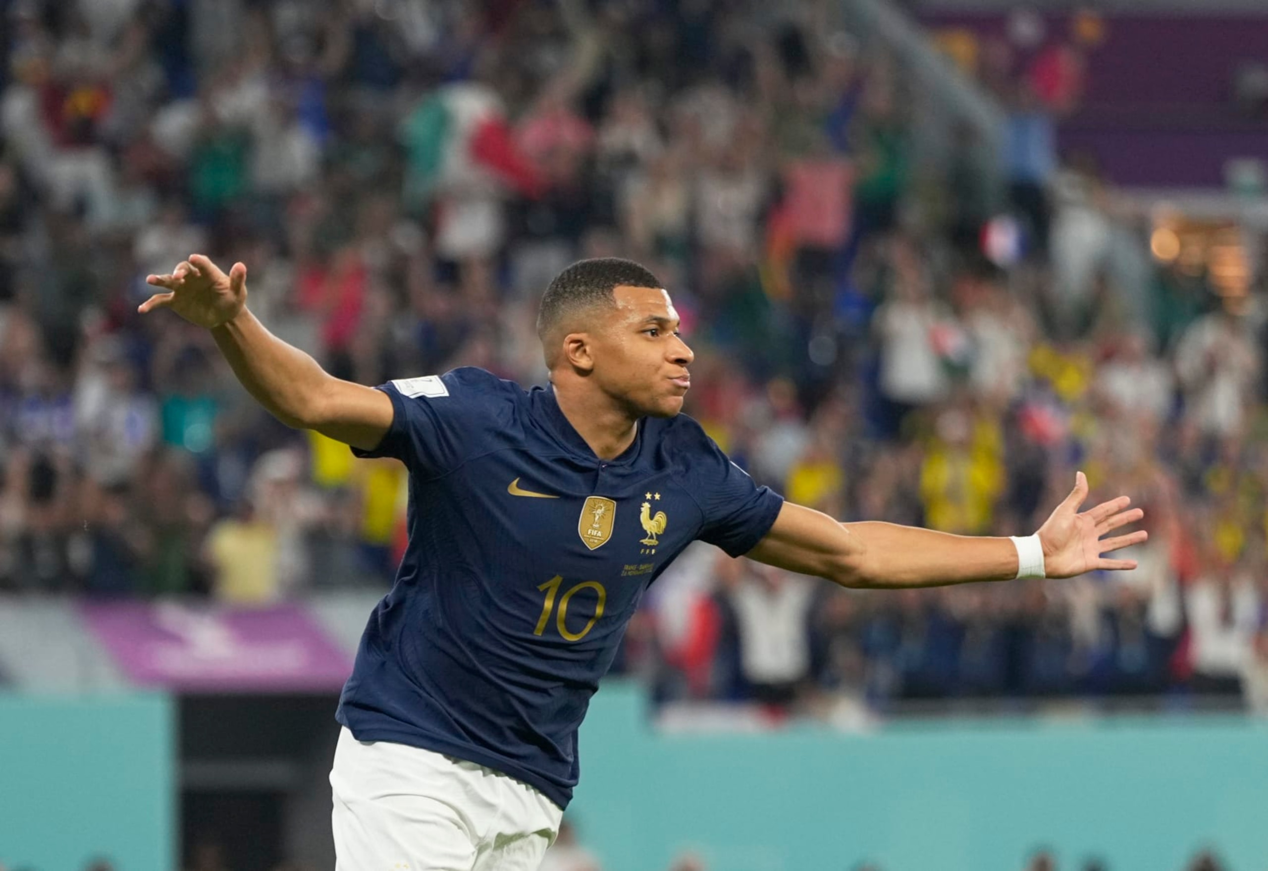 DOHA, QATAR - NOVEMBER 26: Kylian Mbappe of France celebrates scoring his teams first goal during the FIFA World Cup Qatar 2022 Group D match between France and Denmark at Stadium 974 on November 26, 2022 in Doha, Qatar. (Photo by Ulrik Pedersen/DeFodi Images via Getty Images)