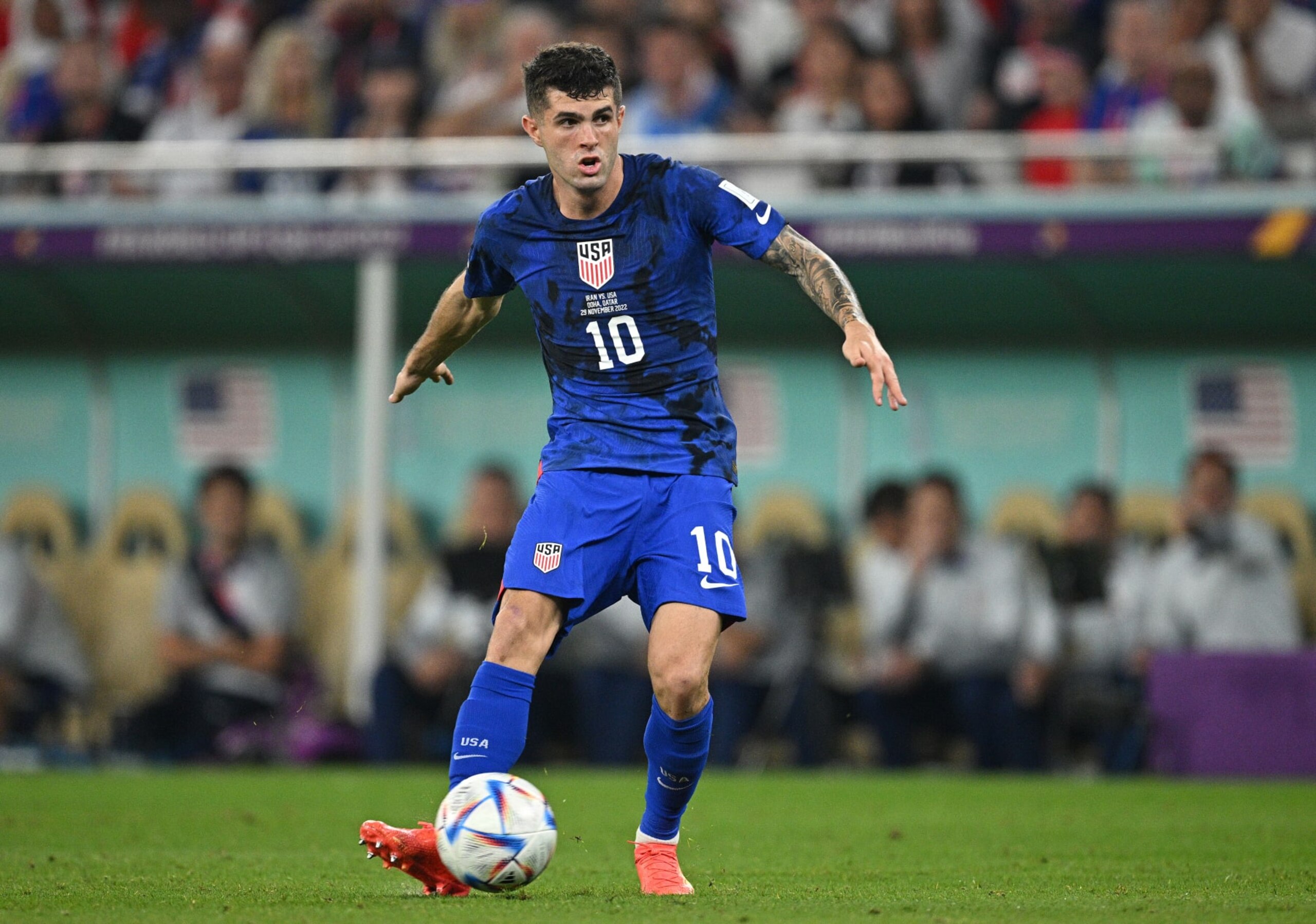 DOHA, QATAR - NOVEMBER 29: Christian Pulisic of USA in action  during the FIFA World Cup Qatar 2022 Group B match between IR Iran and USA at Al Thumama Stadium on November 29, 2022 in Doha, Qatar. (Photo by Stuart Franklin/Getty Images)