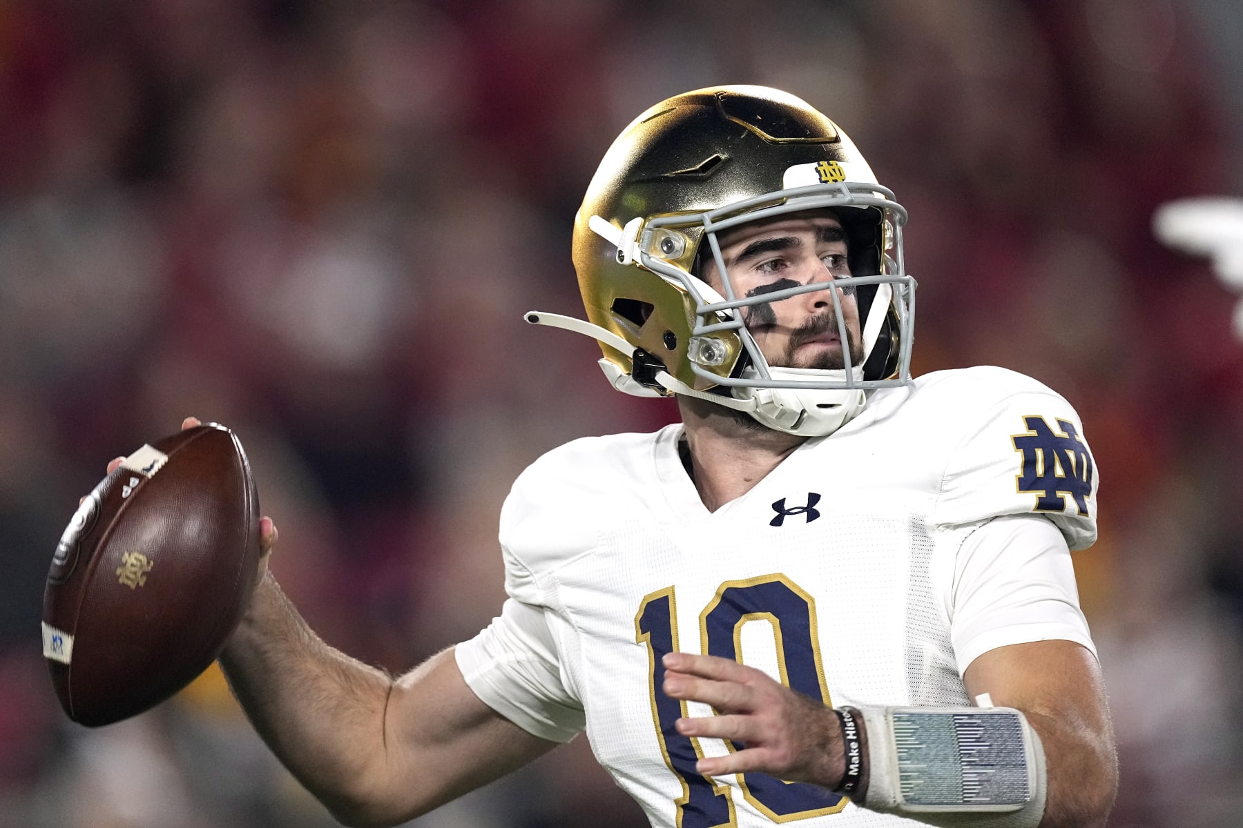 Notre Dame quarterback Drew Pyne passes during the first half of an NCAA college football game against Southern California Saturday, Nov. 26, 2022, in Los Angeles. (AP Photo/Mark J. Terrill)