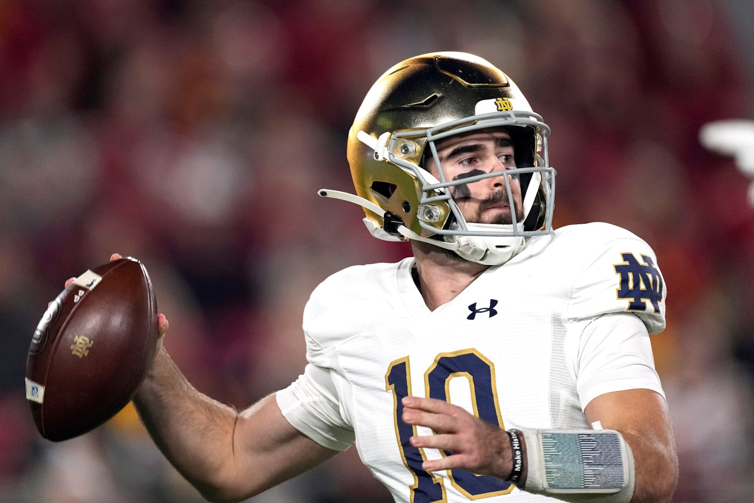 Notre Dame quarterback Drew Pyne passes during the first half of an NCAA college football game against Southern California Saturday, Nov. 26, 2022, in Los Angeles. (AP Photo/Mark J. Terrill)