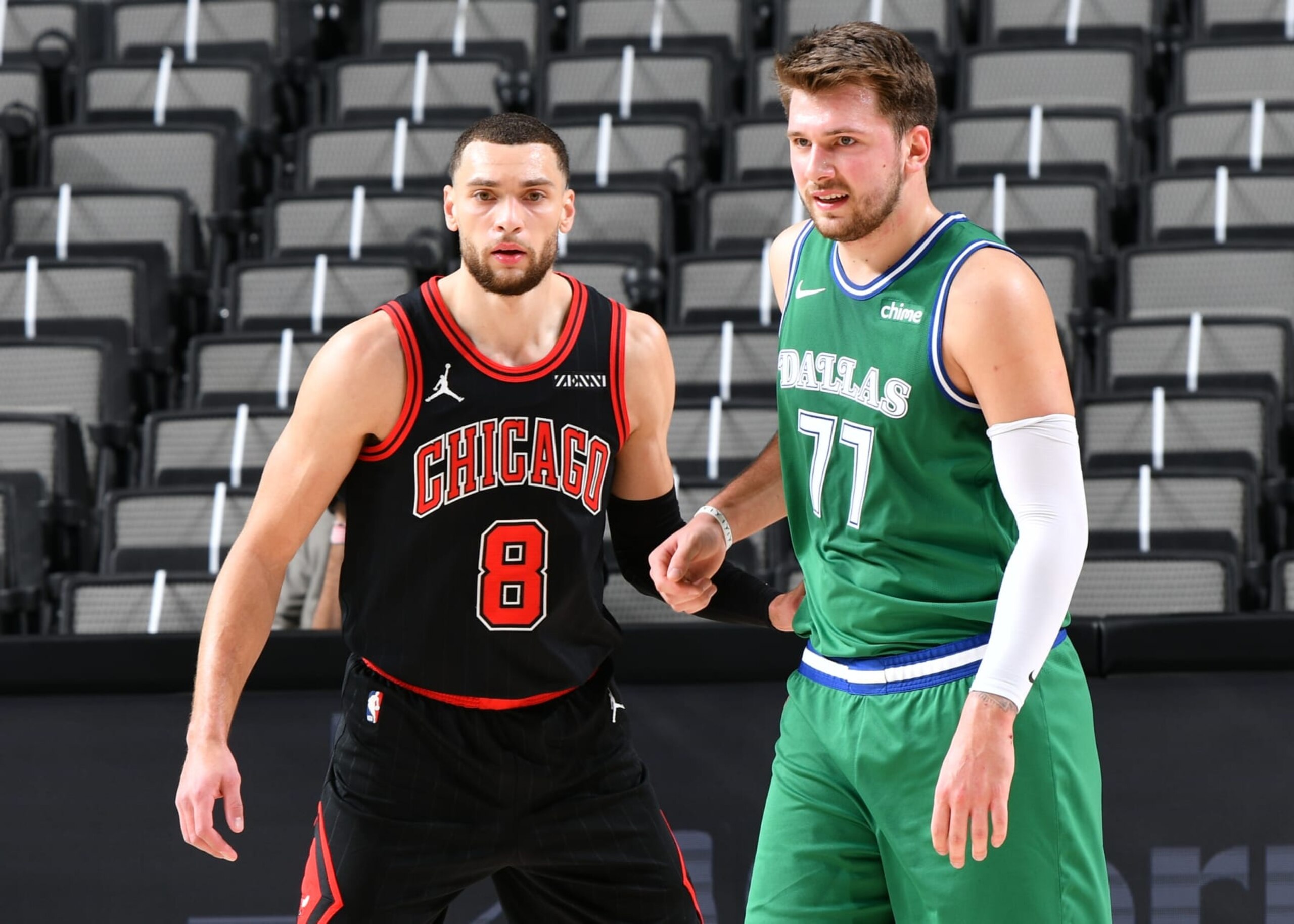 DALLAS, TX - JANUARY 17: Zach LaVine #8 of the Chicago Bulls and Luka Doncic #77 of the Dallas Mavericks fight for position during the game on January 17, 2021 at the American Airlines Center in Dallas, Texas. NOTE TO USER: User expressly acknowledges and agrees that, by downloading and or using this photograph, User is consenting to the terms and conditions of the Getty Images License Agreement. Mandatory Copyright Notice: Copyright 2021 NBAE (Photo by Glenn James/NBAE via Getty Images)