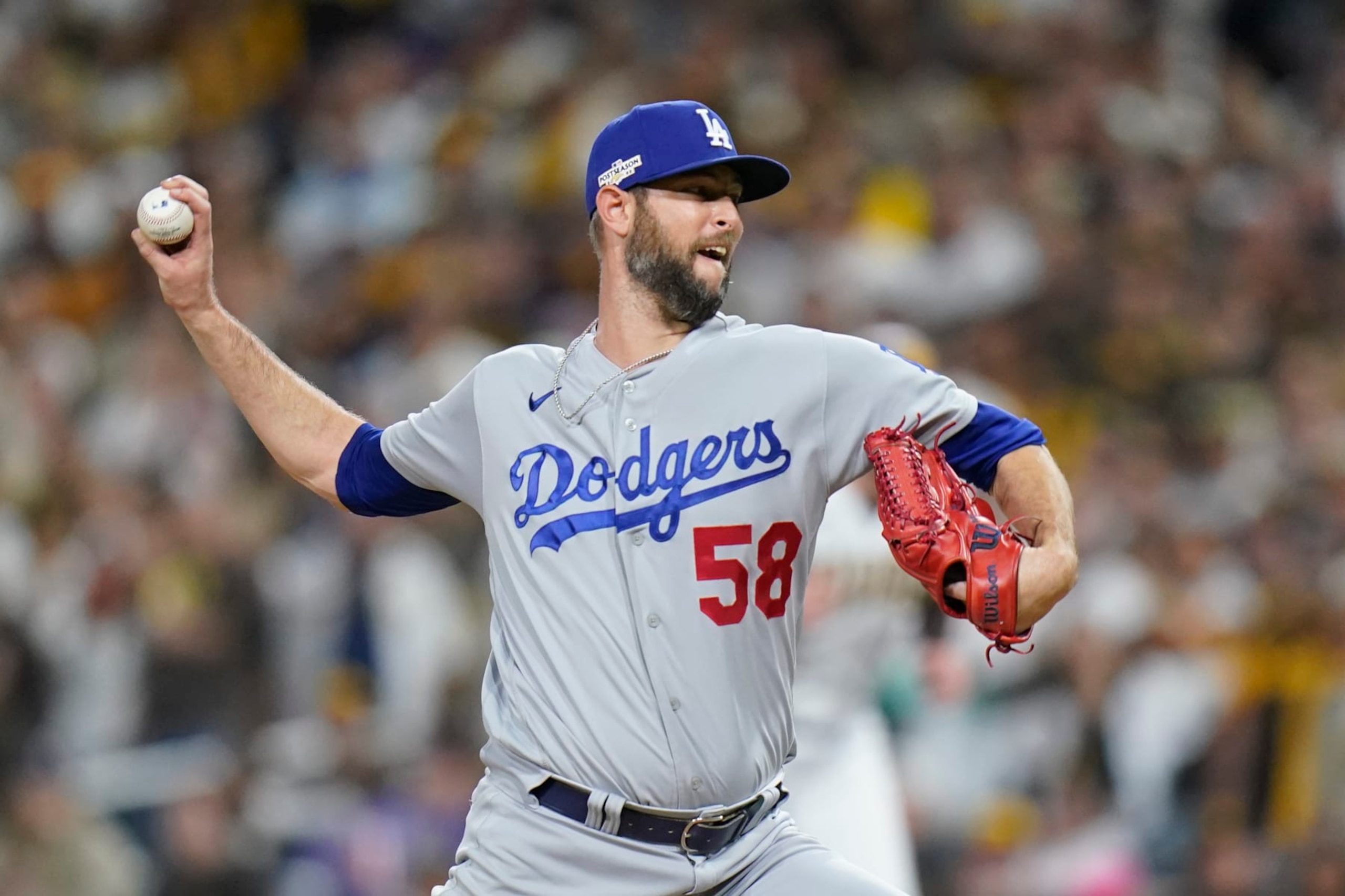 Los Angeles Dodgers relief pitcher Chris Martin works against a San Diego Padres batter during the sixth inning in Game 4 of a baseball NL Division Series, Saturday, Oct. 15, 2022, in San Diego. (AP Photo/Jae C. Hong)