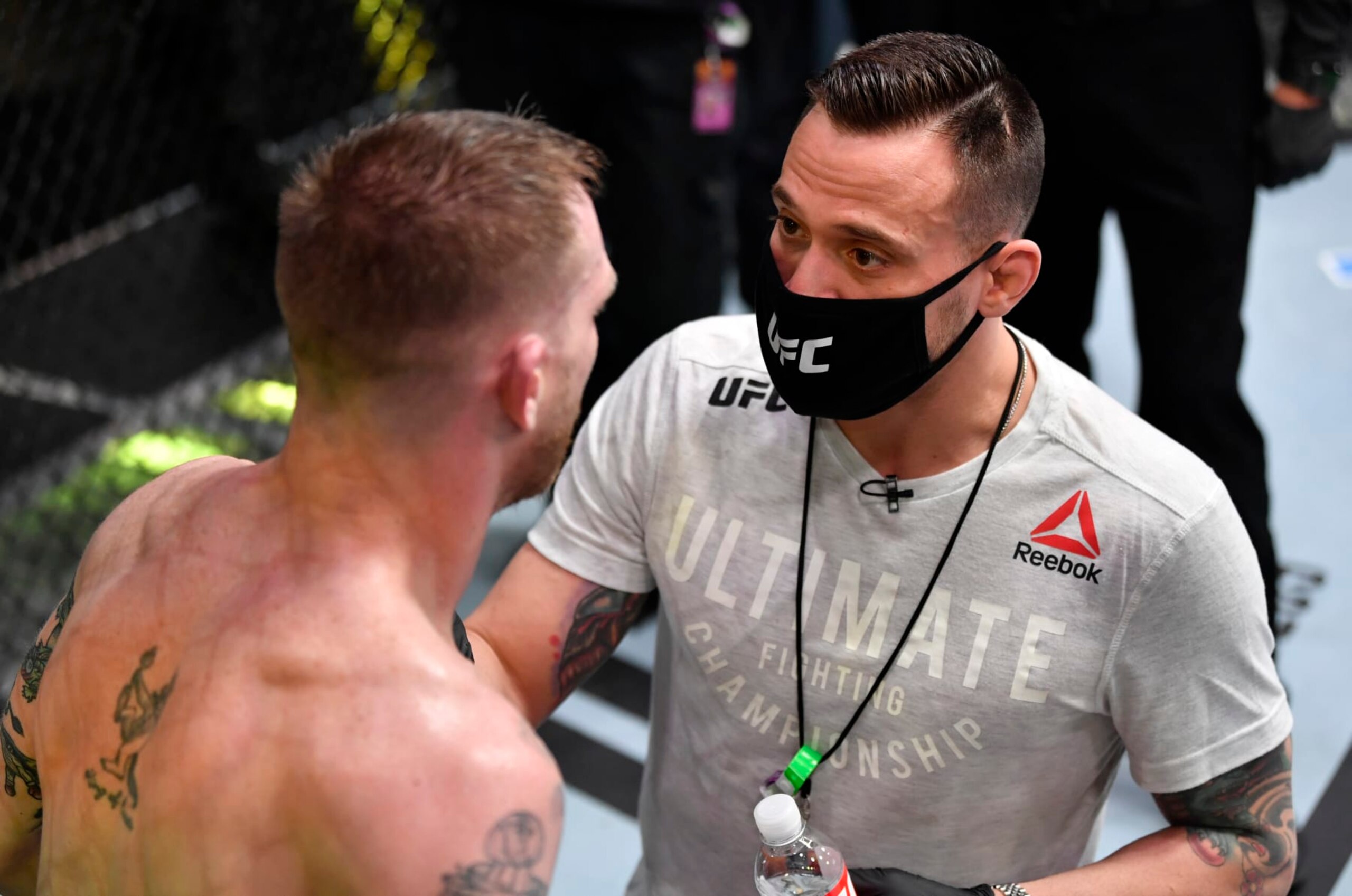 LAS VEGAS, NEVADA - FEBRUARY 27: Coach James Krause provides instruction to Kevin Croom in the corner between rounds of his featherweight bout against Alex Caceres during the UFC Fight Night event at UFC APEX on February 27, 2021 in Las Vegas, Nevada. (Photo by Jeff Bottari/Zuffa LLC) LAS VEGAS, NEVADA - FEBRUARY 27: Coach James Krause provides instruction to Kevin Croom in the corner between rounds of his featherweight bout against Alex Caceres during the UFC Fight Night event at UFC APEX on February 27, 2021 in Las Vegas, Nevada. (Photo by Jeff Bottari/Zuffa LLC)