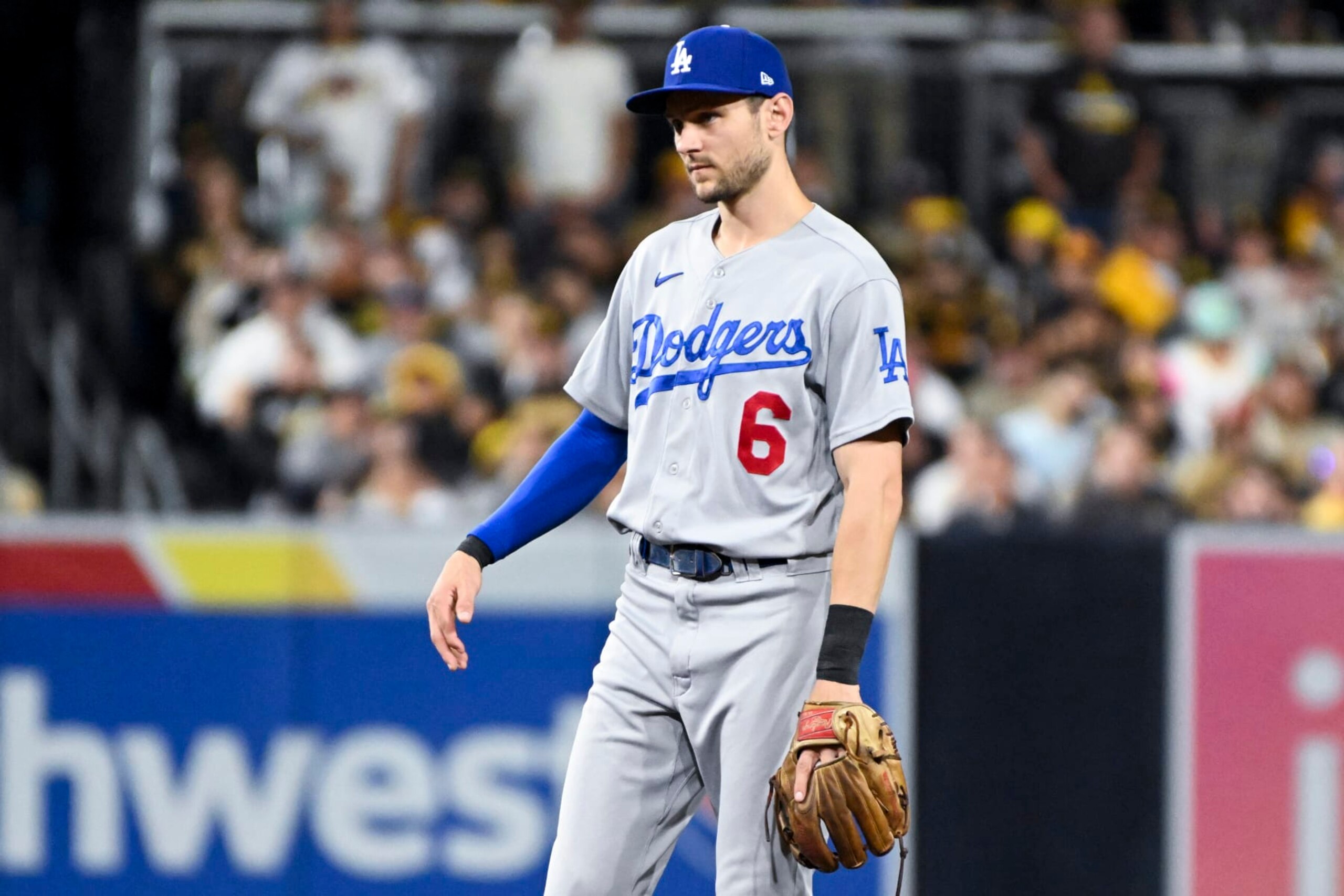 San Diego, CA - October 15: Los Angeles Dodgers Trea Turner shakes his hand while standing near second base during the second inning against the San Diego Padres in game 4 of the NLDS at Petco Park on Saturday, Oct. 15, 2022 in San Diego, CA. (Wally Skalij / Los Angeles Times via Getty Images)