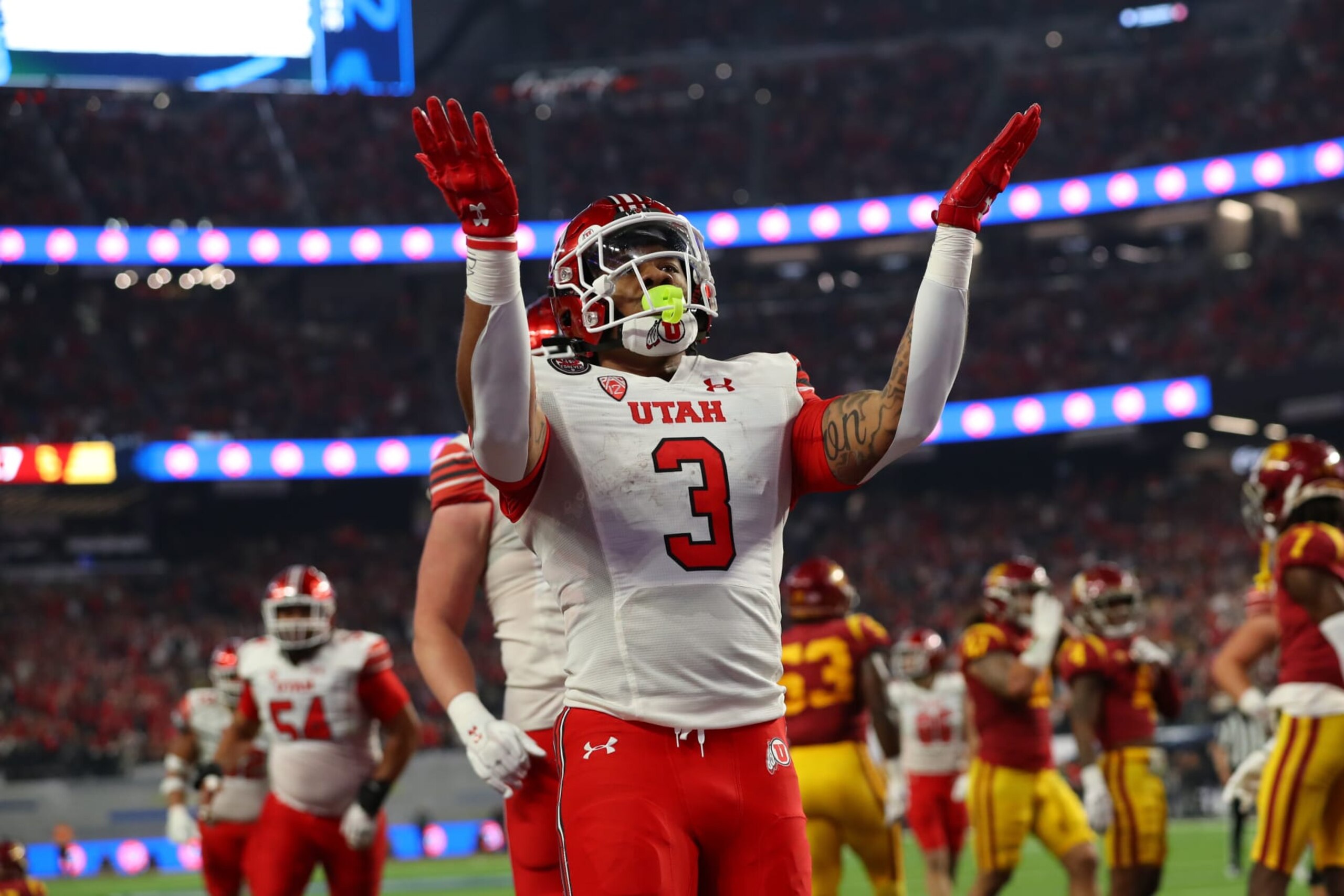 LAS VEGAS, NV - DECEMBER 02: Utah Utes running back Ja'Quinden Jackson (3) celebrates after scoring a touchdown during the Pac-12 Conference championship game between the Utah Utes and the USC Trojans at Allegiant Stadium on December 2, 2022 in Las Vegas, Nevada. (Photo by Jordon Kelly/Icon Sportswire via Getty Images)
