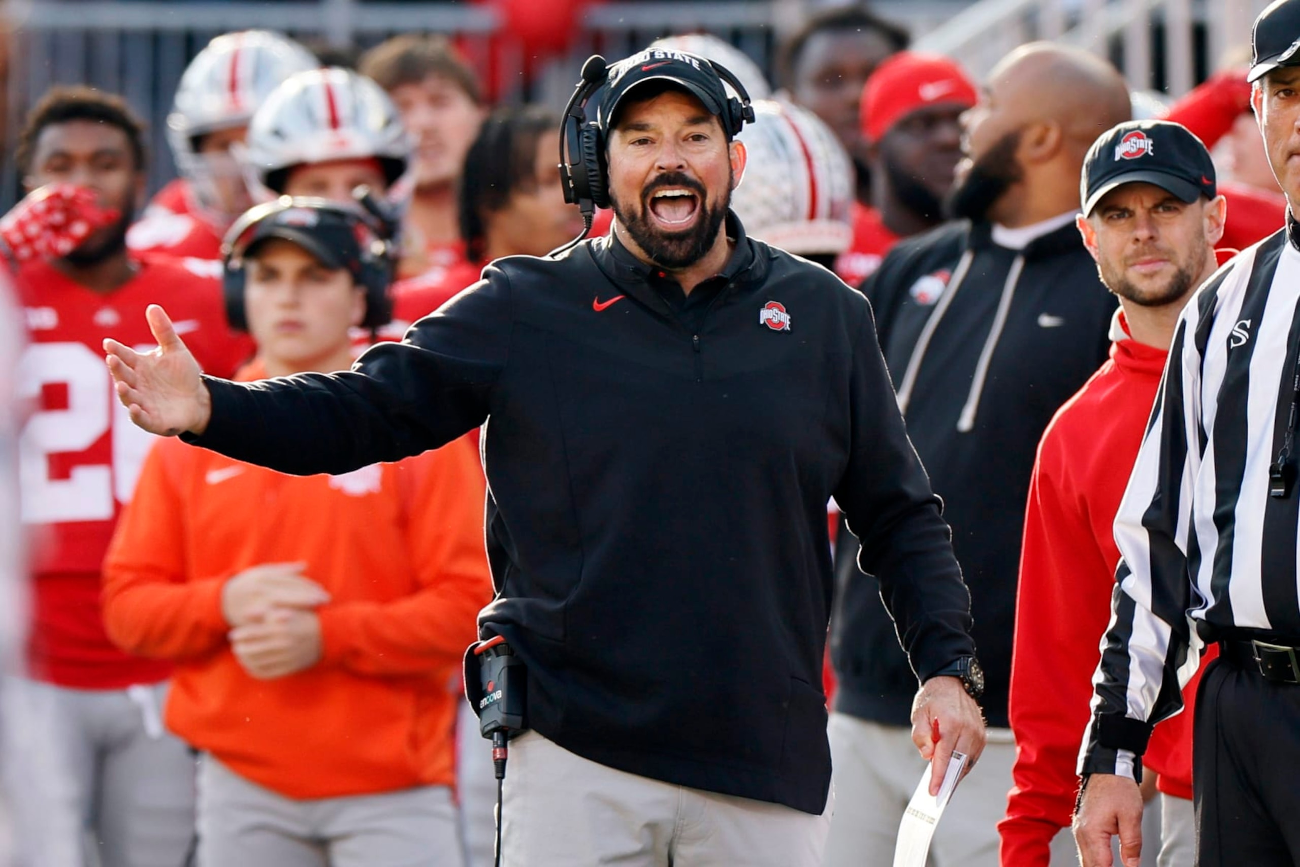 Ohio State head coach Ryan Day questions a referee's call during the second half of an NCAA college football game against Michigan on Saturday, Nov. 26, 2022, in Columbus, Ohio. (AP Photo/Jay LaPrete)