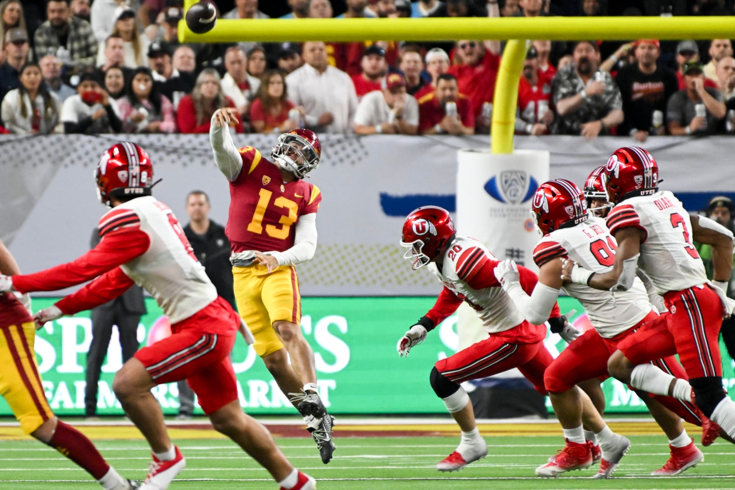 Las Vegas, CA - December 02: USC Trojans quarterback Caleb Williams throw for a first down to wide receiver Jordan Addison during the fourth quarter of the Pac-12 Championship against the Utah Utes at Allegiant Stadium on Friday, Dec. 2, 2022 in Las Vegas, CA. (Wally Skalij / Los Angeles Times via Getty Images)
