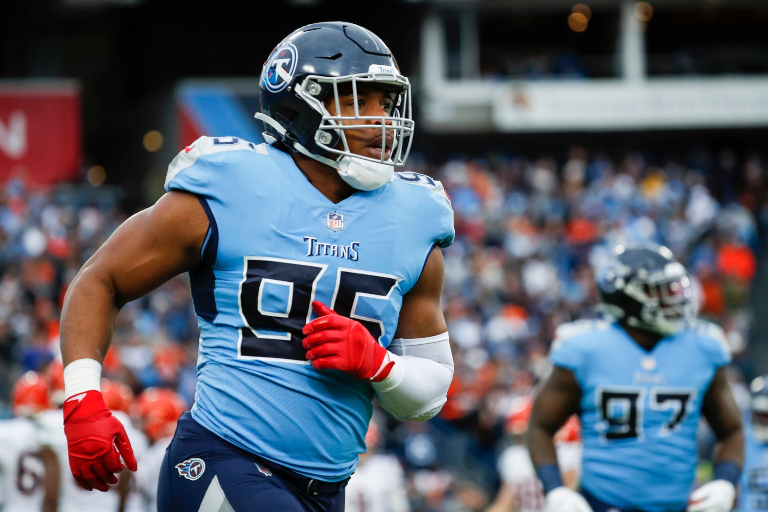 NASHVILLE, TENNESSEE - NOVEMBER 27: DeMarcus Walker #95 of the Tennessee Titans walks off the field after a play against the Cincinnati Bengals at Nissan Stadium on November 27, 2022 in Nashville, Tennessee. (Photo by Silas Walker/Getty Images)