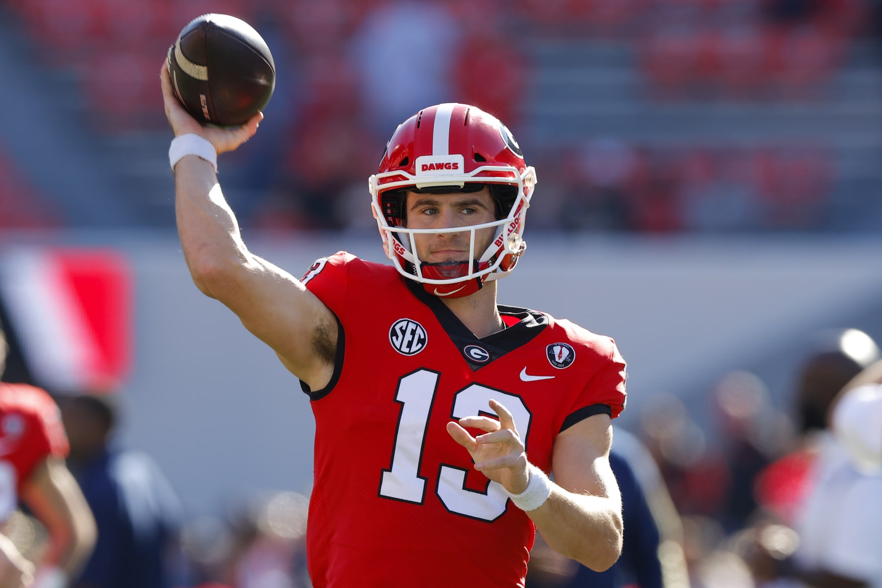 ATHENS, GA - NOVEMBER 26: Stetson Bennett #13 of the Georgia Bulldogs warms up prior to the game against the Georgia Tech Yellow Jackets at Sanford Stadium on November 26, 2022 in Athens, Georgia. (Photo by Todd Kirkland/Getty Images)
