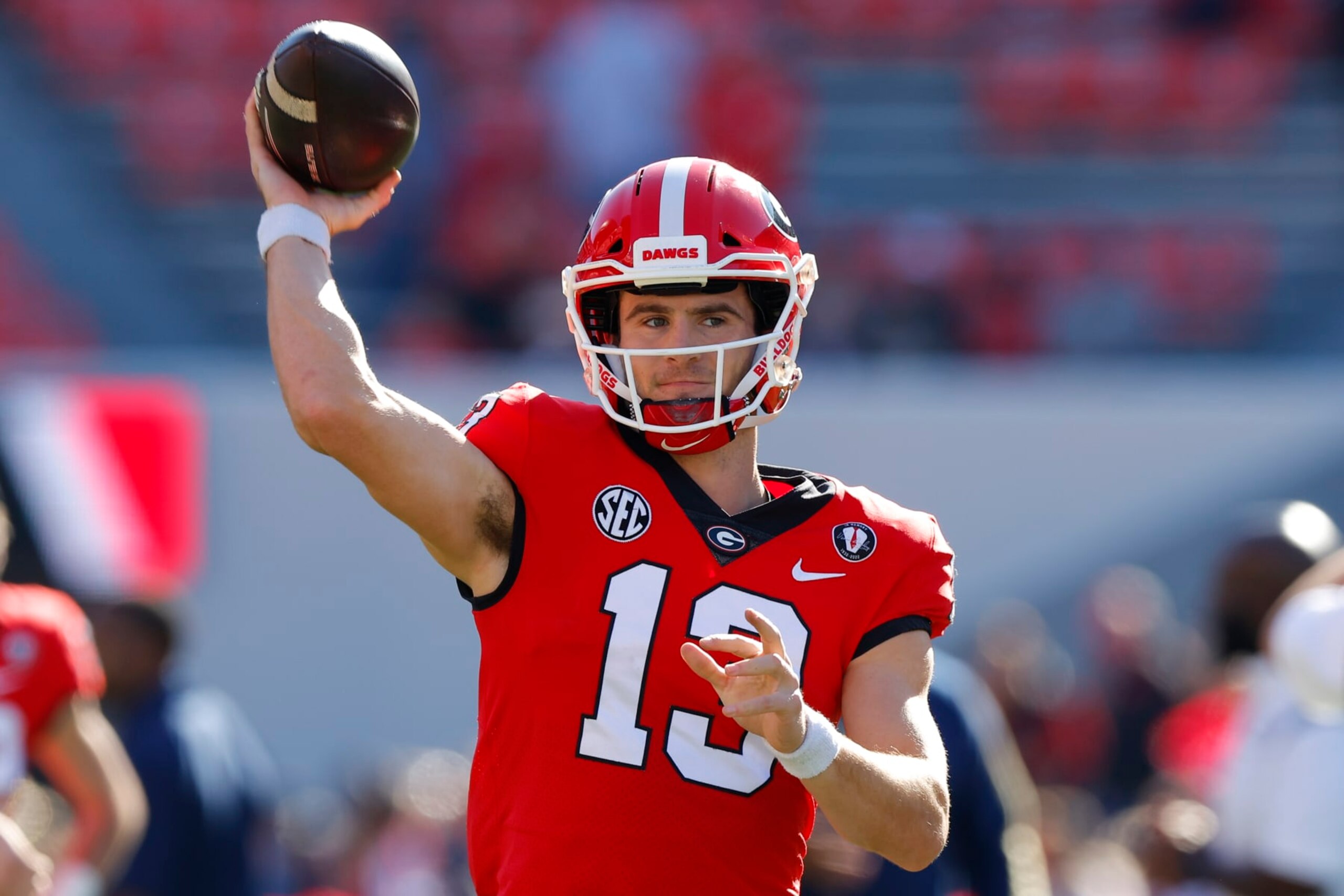 ATHENS, GA - NOVEMBER 26: Stetson Bennett #13 of the Georgia Bulldogs warms up prior to the game against the Georgia Tech Yellow Jackets at Sanford Stadium on November 26, 2022 in Athens, Georgia. (Photo by Todd Kirkland/Getty Images)