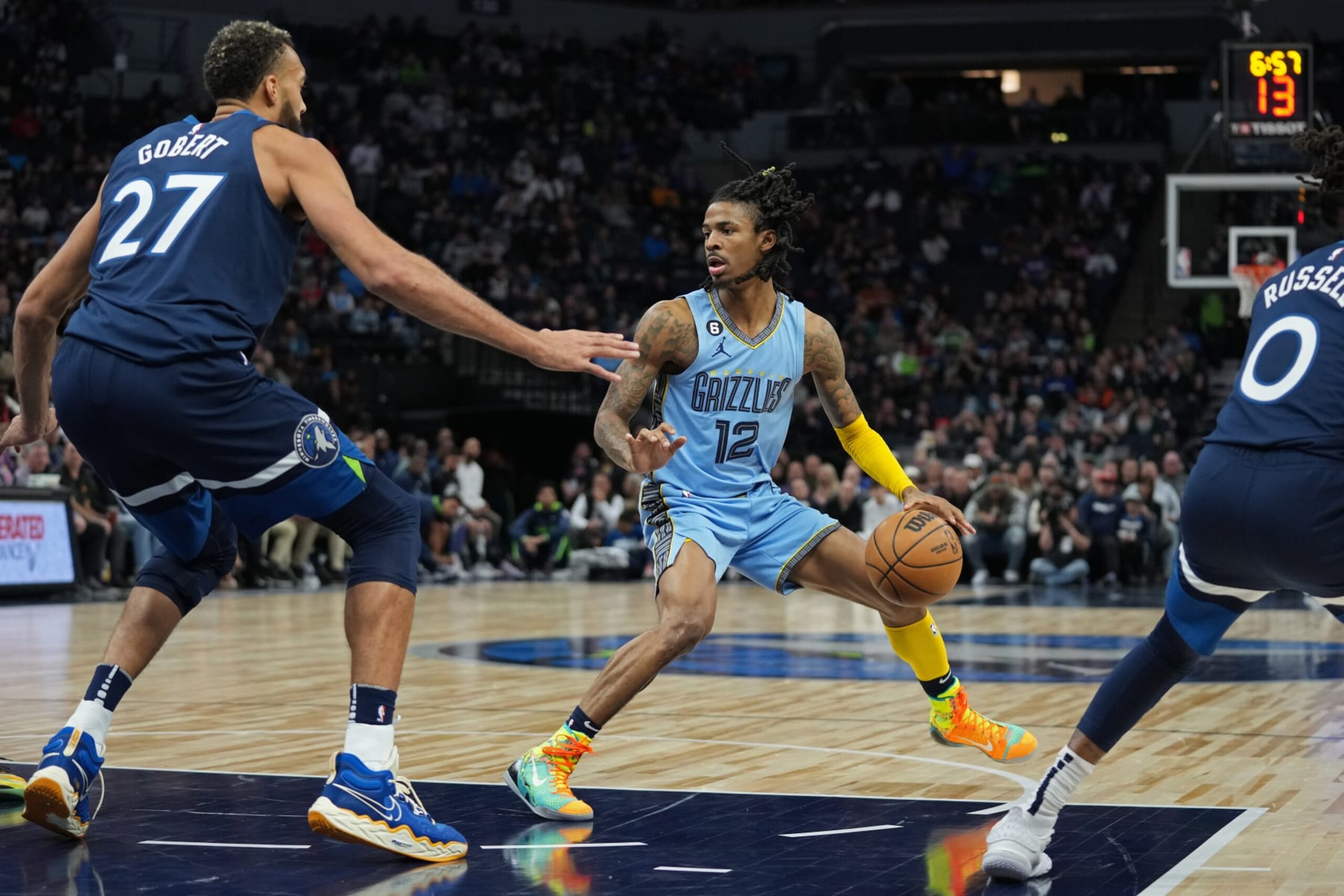 MINNEAPOLIS, MN -  NOVEMBER 30: Ja Morant #12 of the Memphis Grizzlies dribbles the ball against the Minnesota Timberwolves on November 30, 2022 at Target Center in Minneapolis, Minnesota. NOTE TO USER: User expressly acknowledges and agrees that, by downloading and or using this Photograph, user is consenting to the terms and conditions of the Getty Images License Agreement. Mandatory Copyright Notice: Copyright 2022 NBAE (Photo by Jordan Johnson/NBAE via Getty Images)