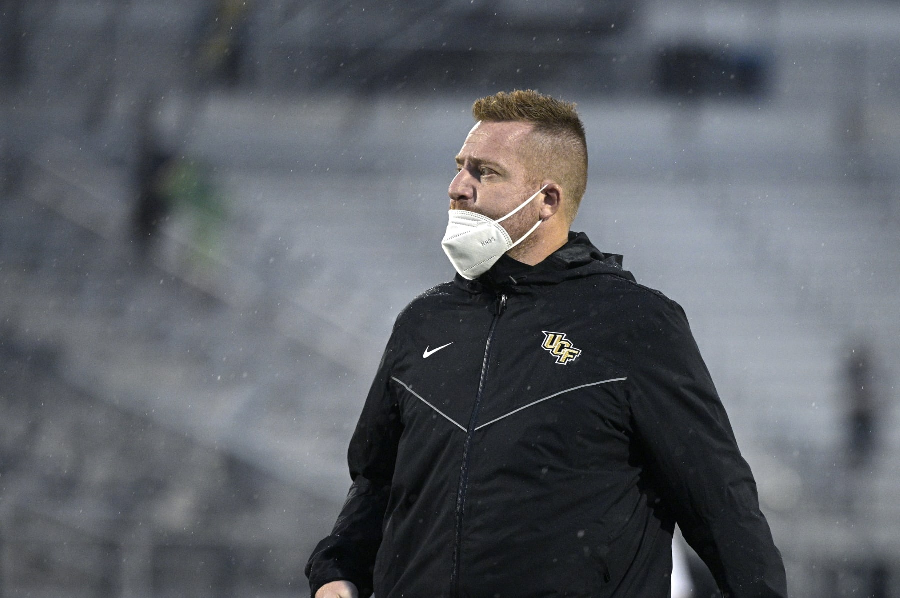 Central Florida co-offensive coordinator and tight ends coach Alex Golesh watches warmups before an NCAA college football game against Tulsa, Saturday, Oct. 3, 2020, in Orlando, Fla. (AP Photo/Phelan M. Ebenhack)